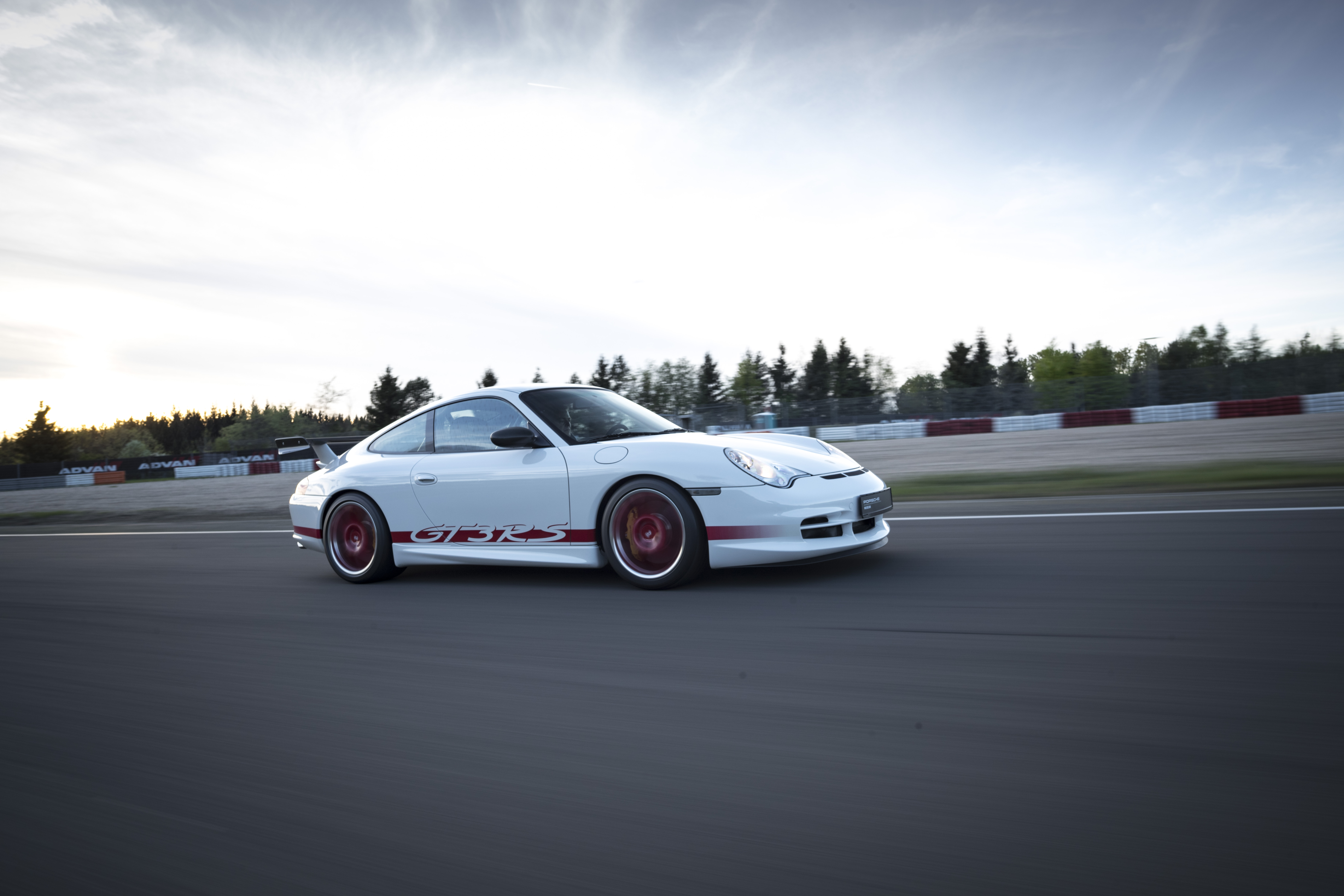 Porsche 996 GT3 RS driving on a track