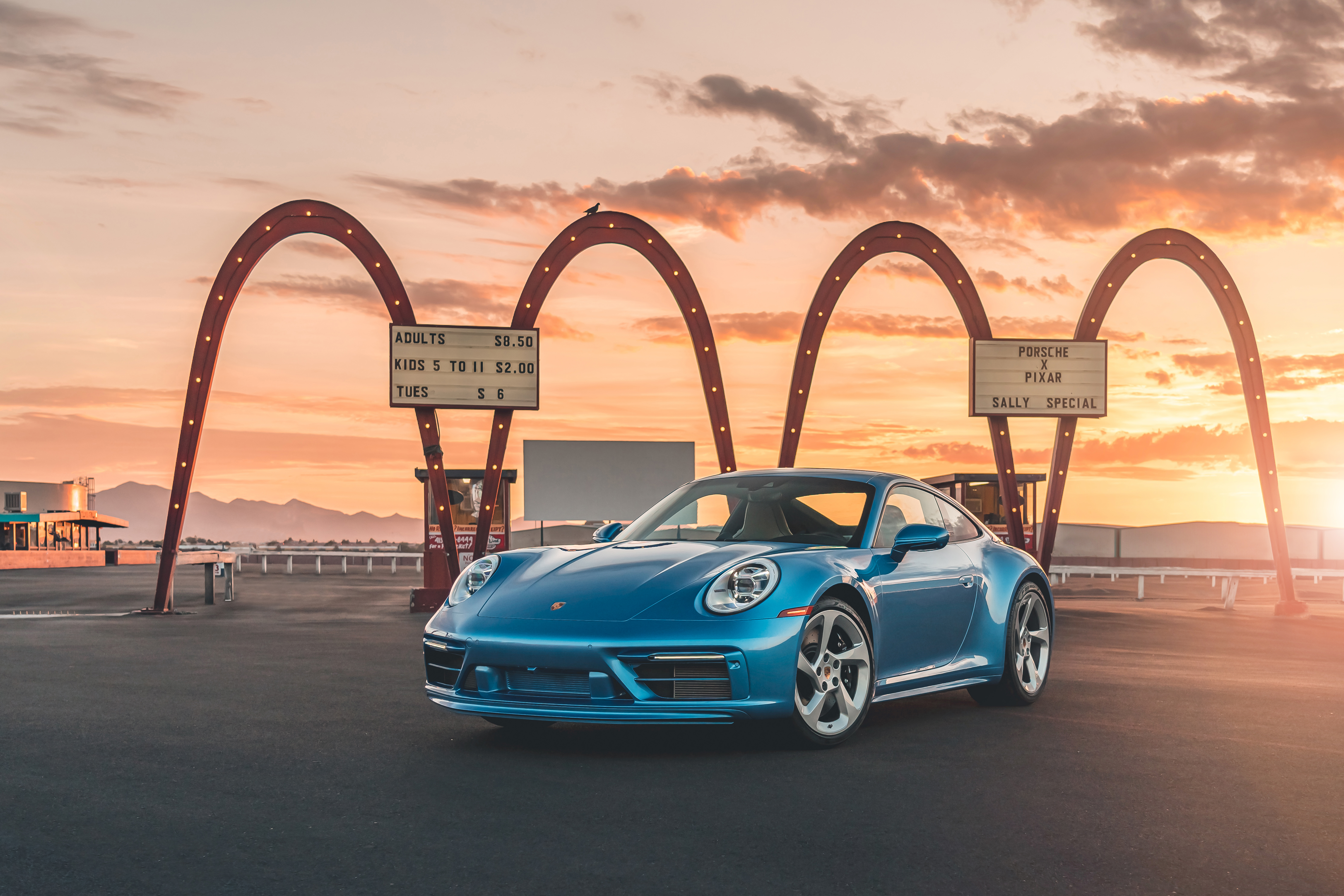 Blue Porsche 911 Sally Special at sunset in US desert