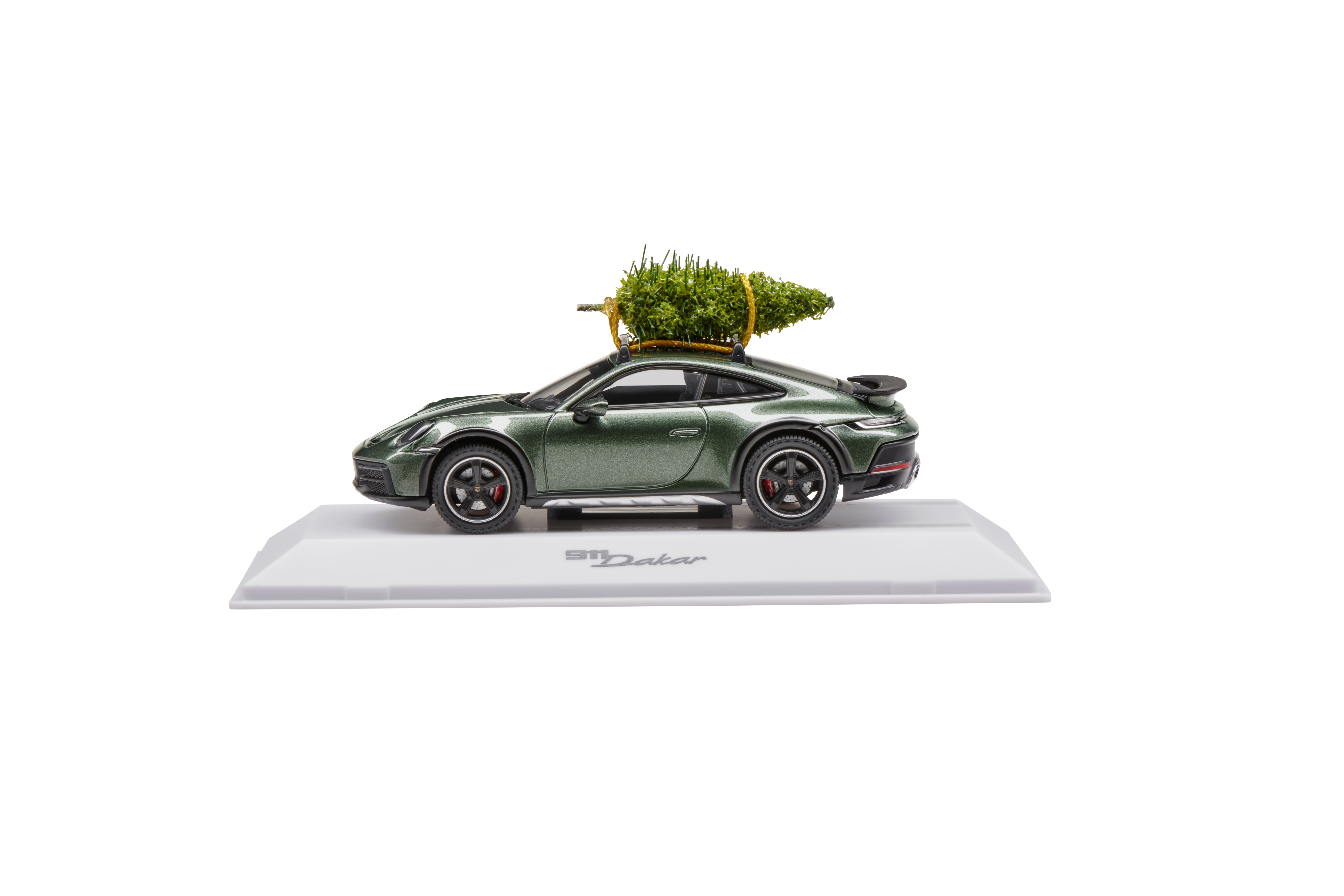 Miniature Porsche 911 Dakar with Christmas tree on the roof
