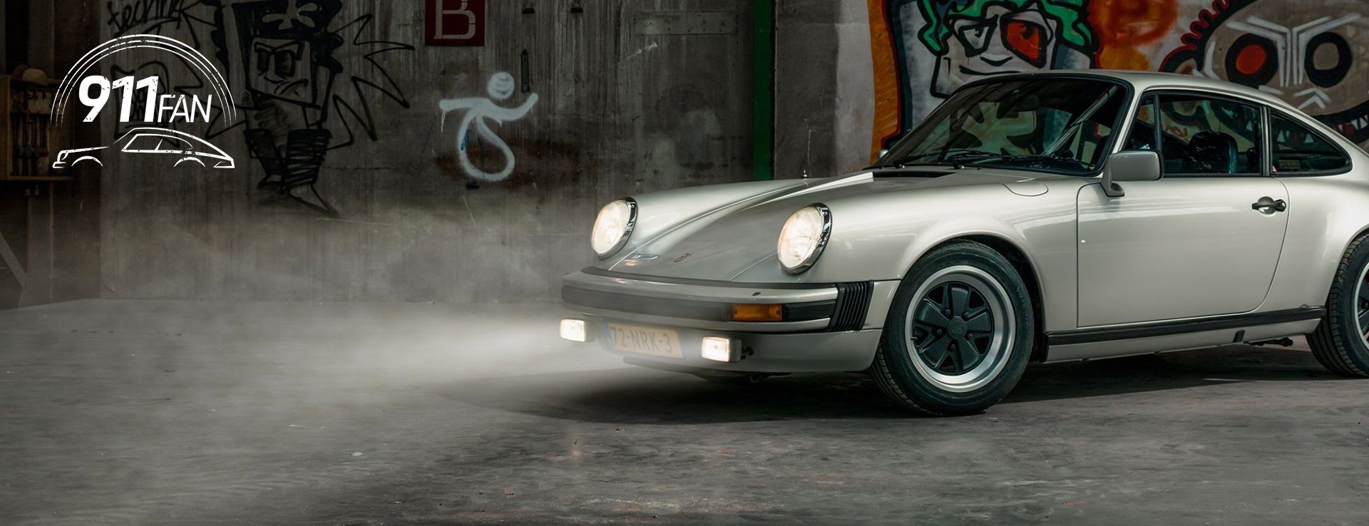 Zinmetallic Porsche 911 SC with headlights on