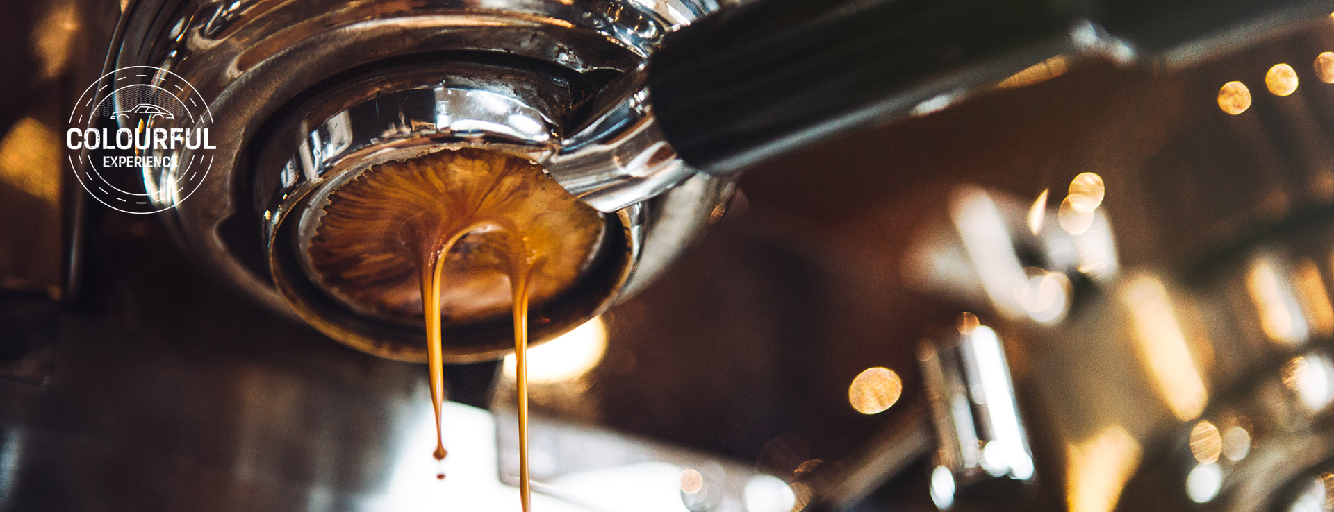 brown espresso coffee dripping through machine