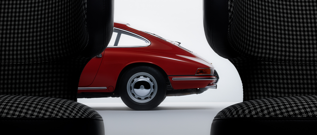 Classic Porsche 911 with Porsche Pepita Edition by Vitra chairs