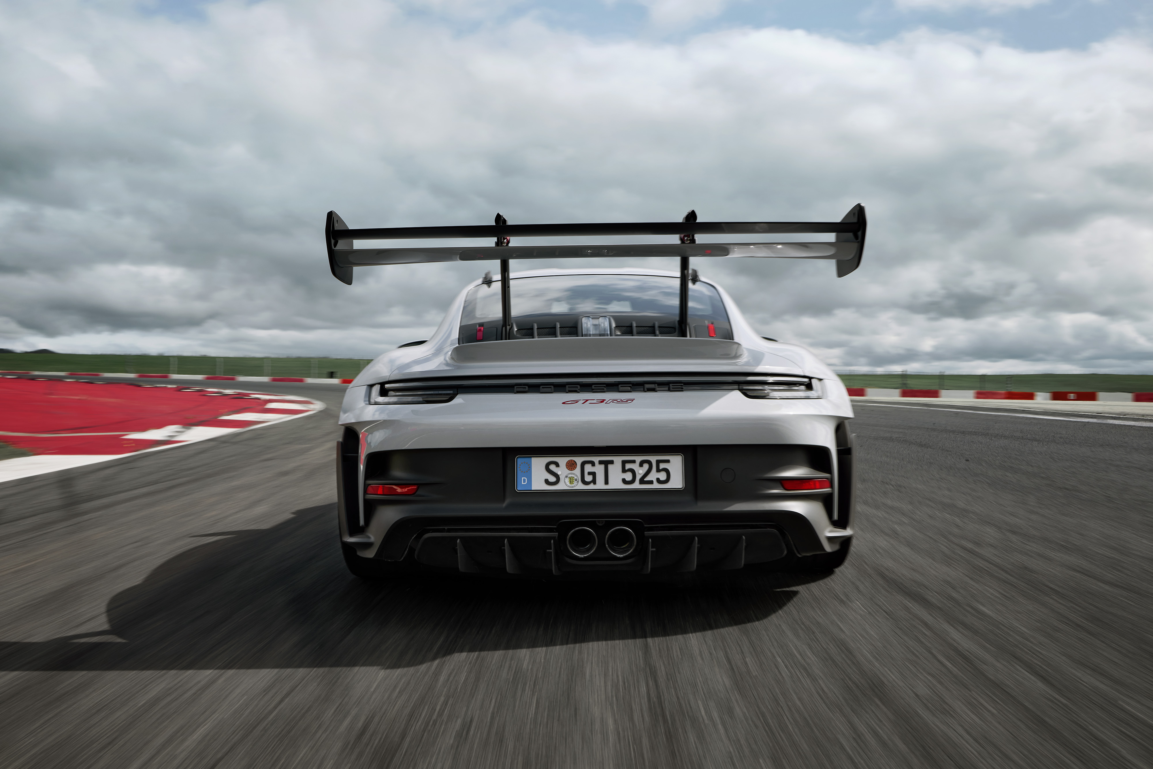 Rear view of a Porsche 992 GT3 RS on track