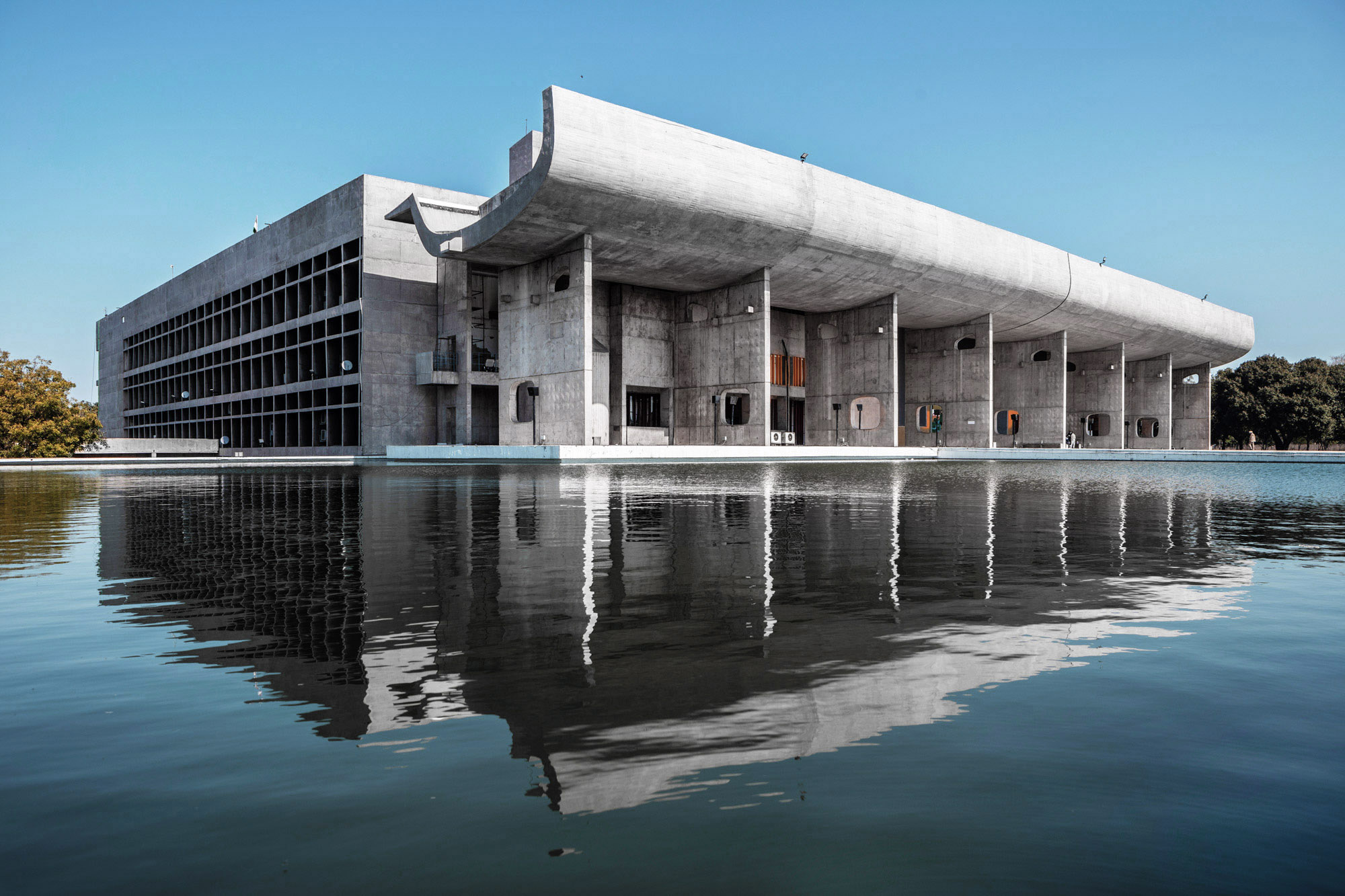 Concrete building with artificial lake