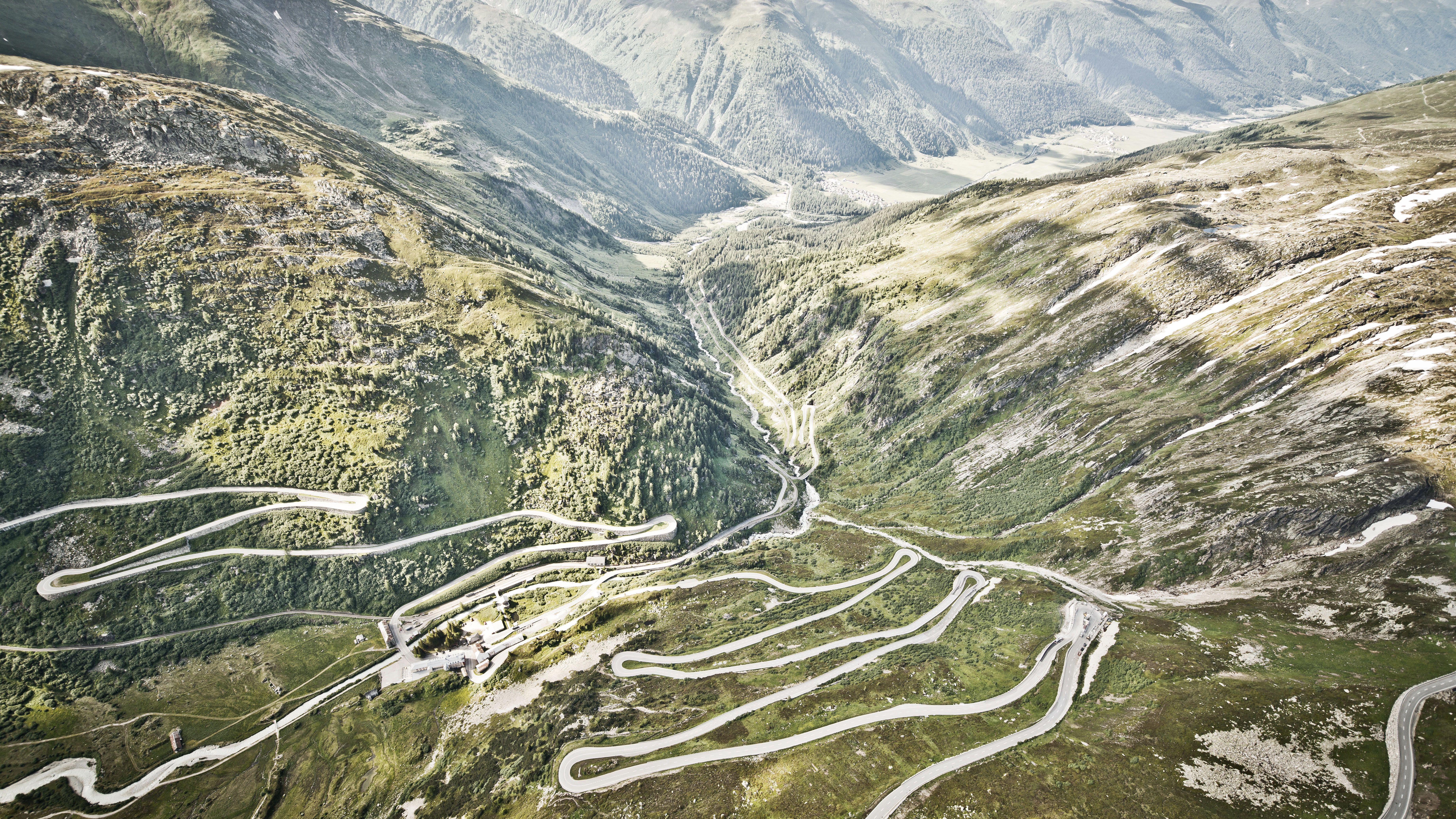 Aerial shot of winding Grimsel Pass mountain road in Switzerland