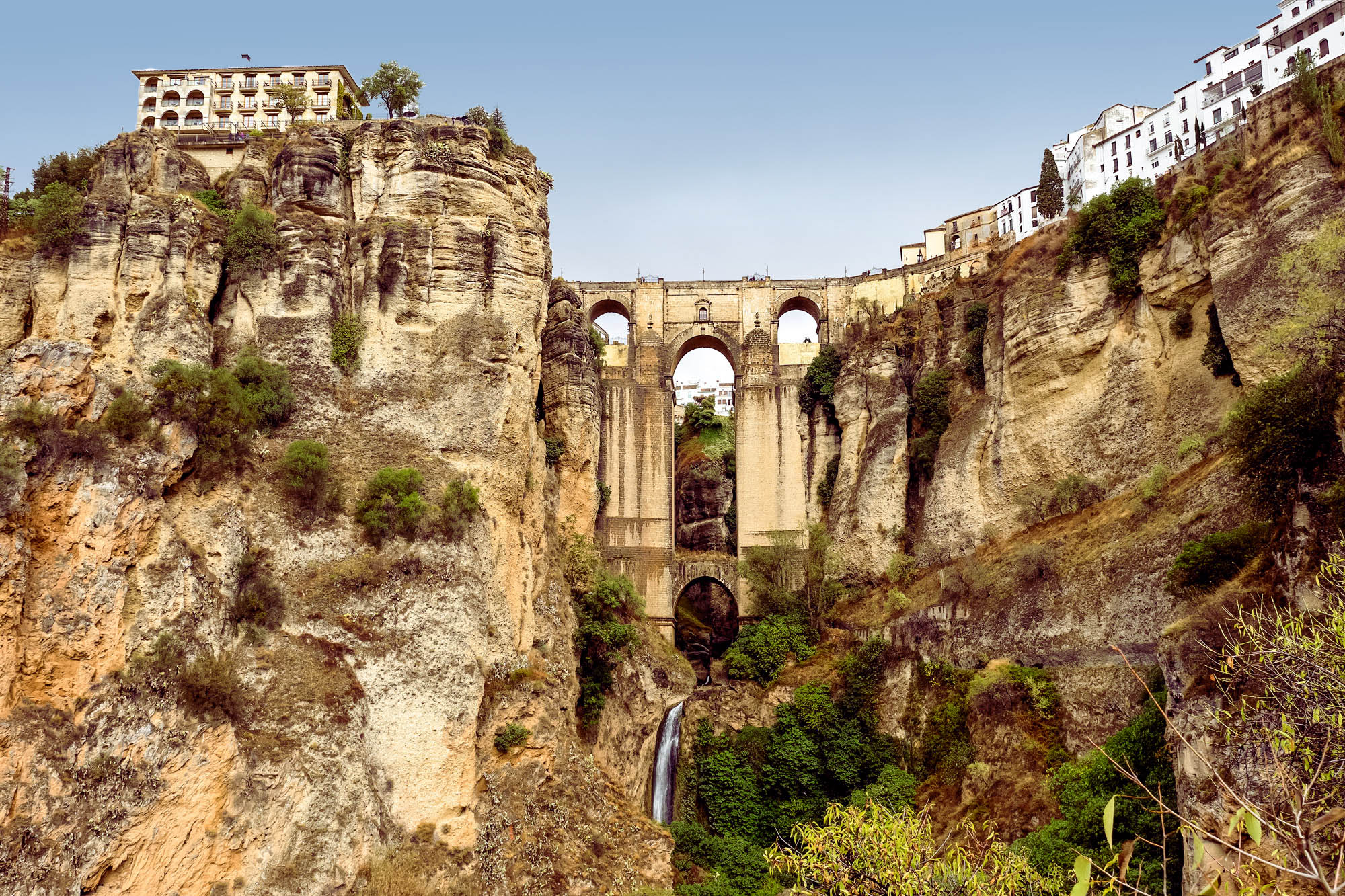 The bridge connects two districts on a rocky outcrop