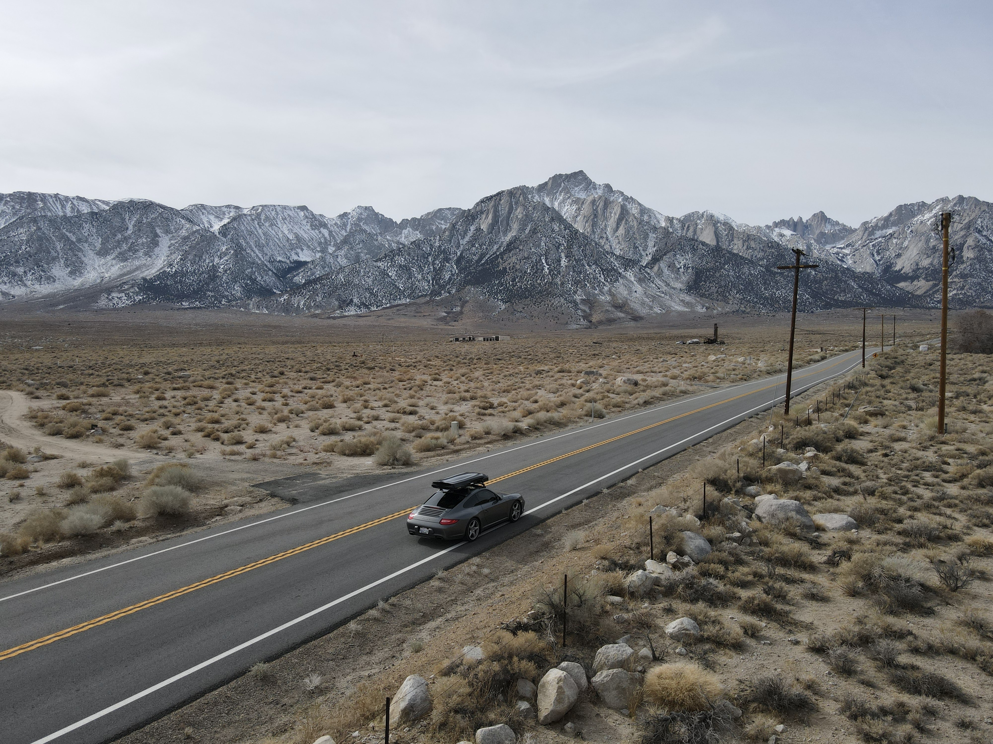 Porsche 911 (type 997) on road, Mount Whitney in background