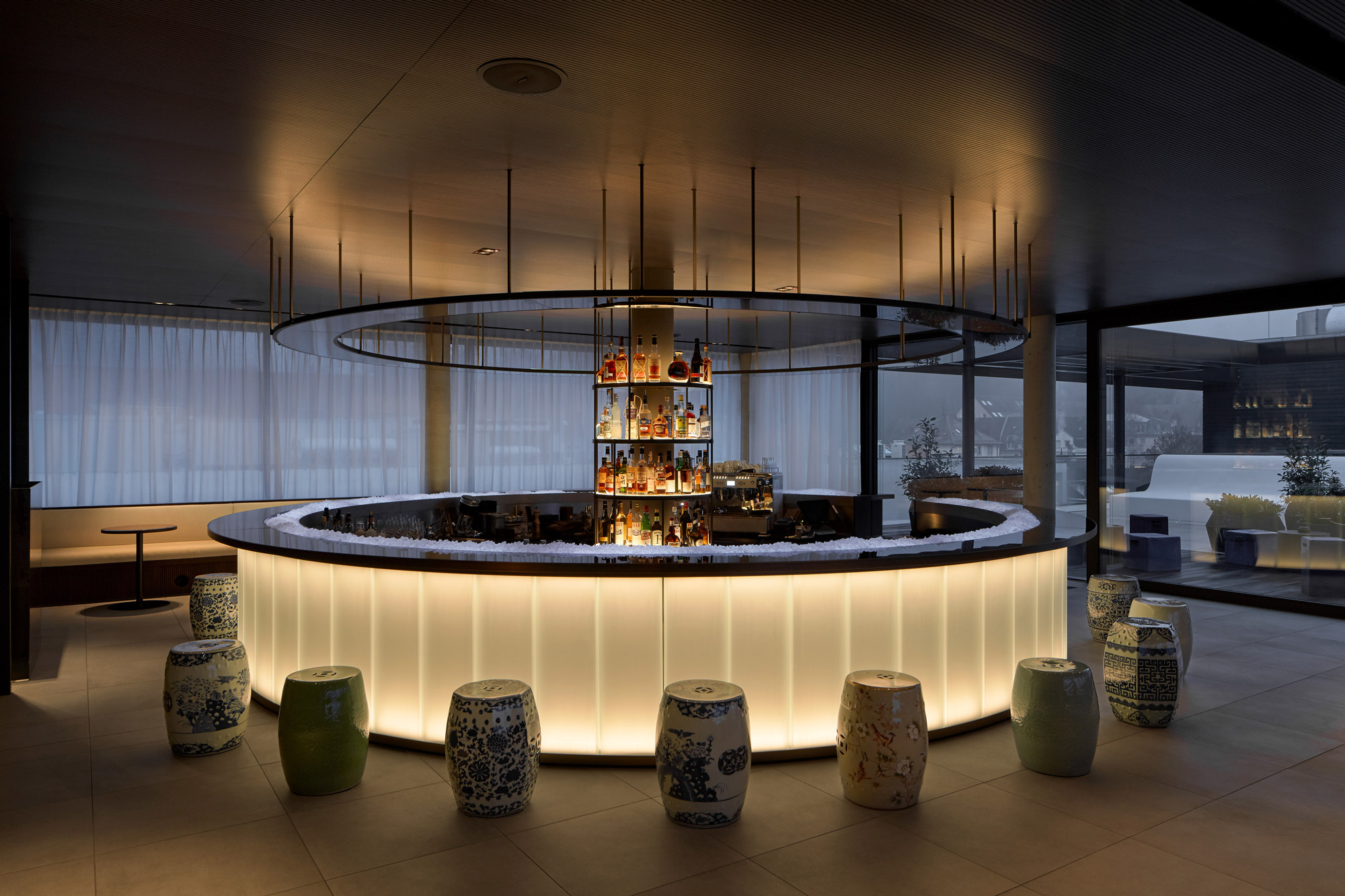 Round, modern hotel bar with mood lighting