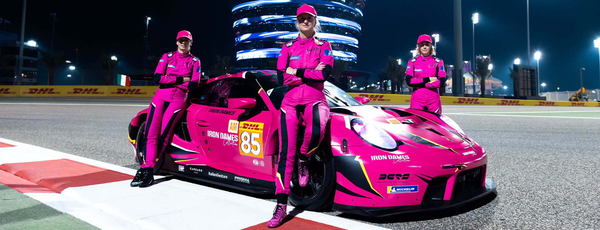 Iron Dames with pink 911 RSR at night on track