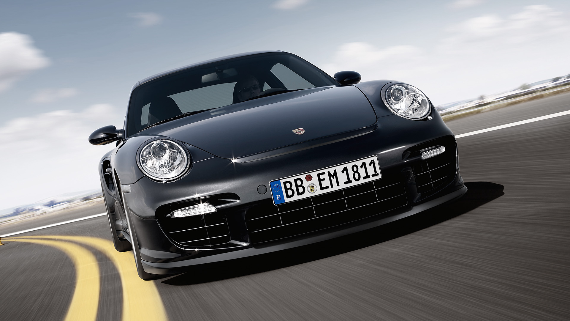 Porsche 911 GT2 type 997 black on racetrack_desktop