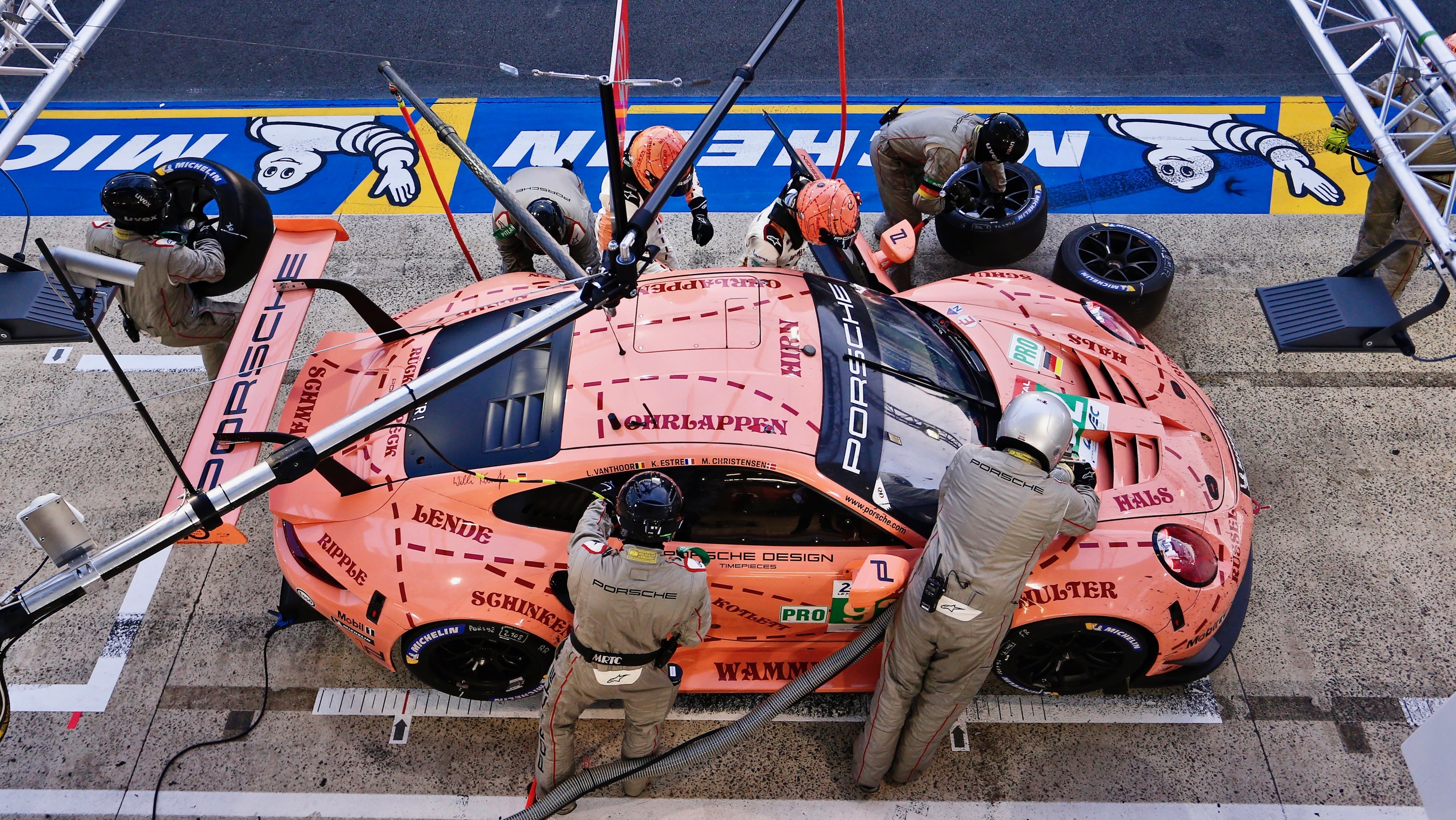 Porsche 911 RSR in Pink Pig livery at pit stop