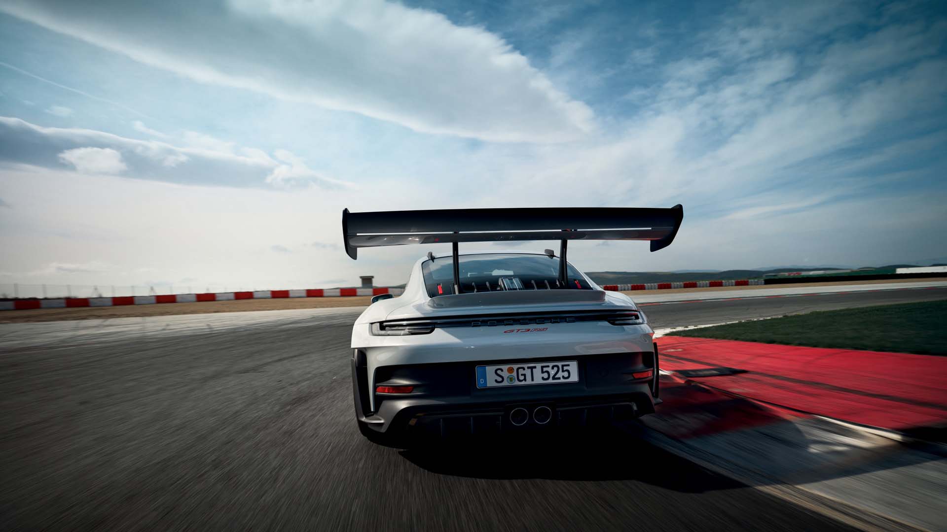 Porsche 911 GT3 RS driving racetrack corner wallpaper desktop 5