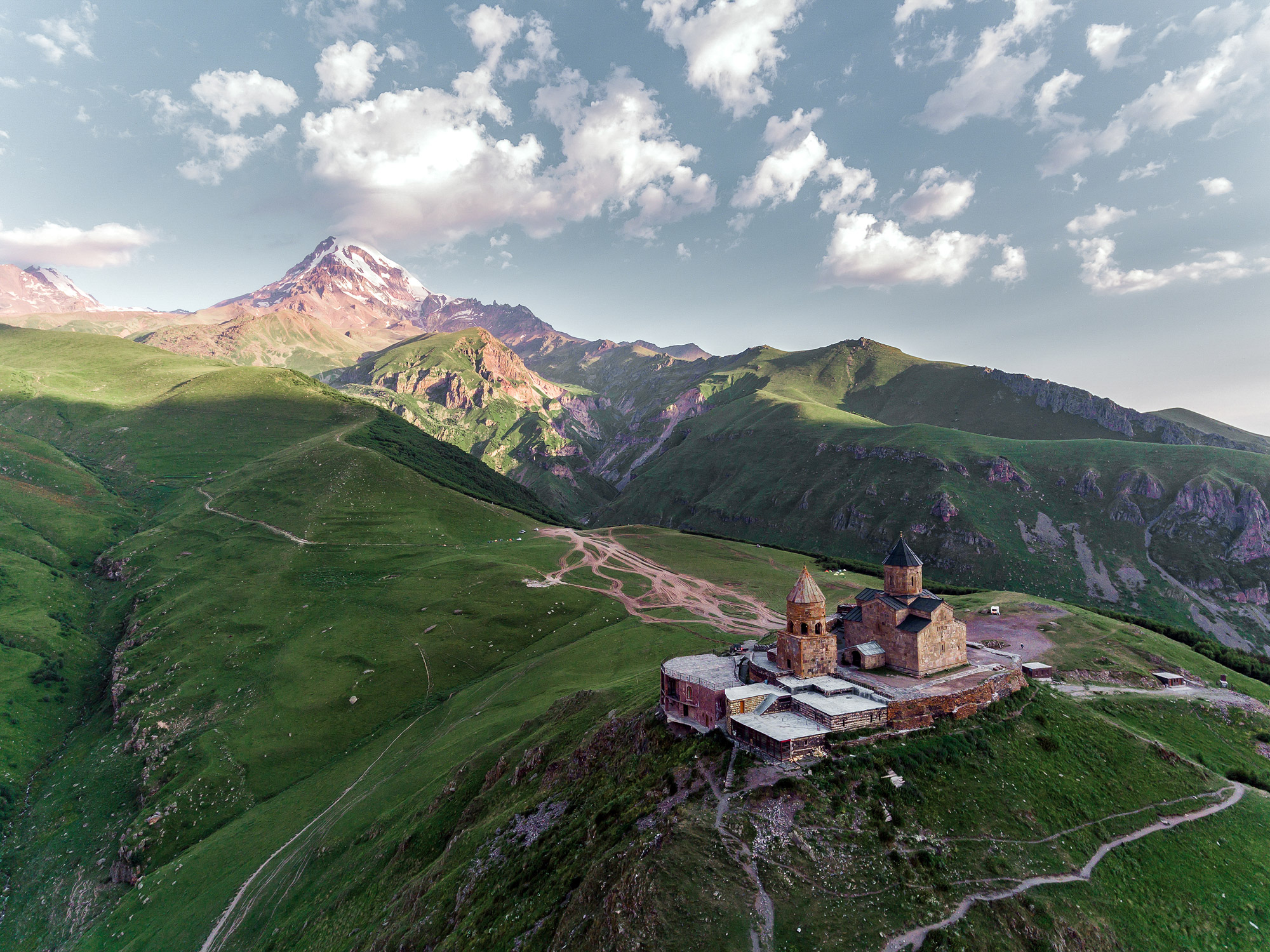 A remote hilltop monastery surrounded by gorges and mountains