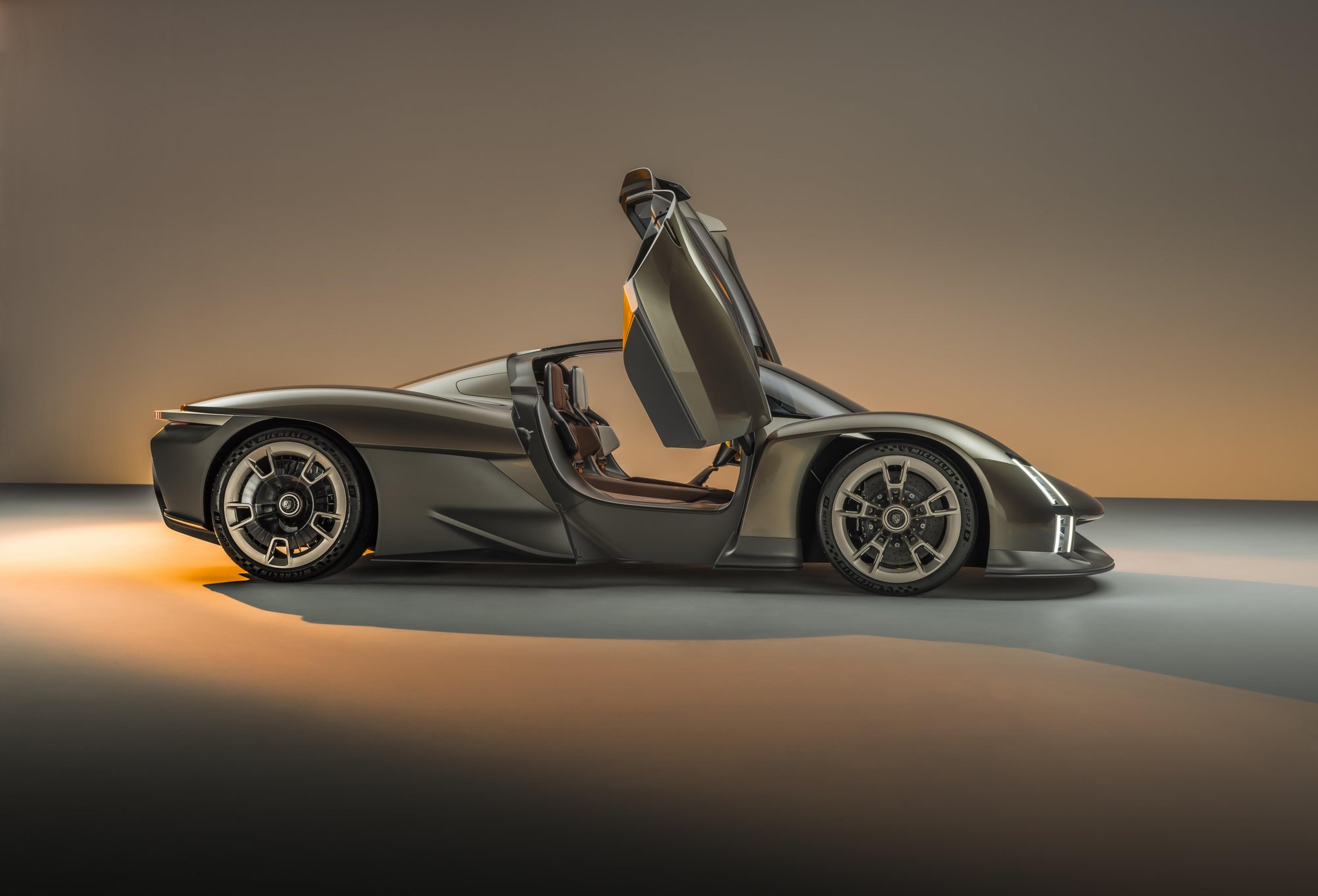 Side-on view of Porsche Mission X concept hypercar, doors open