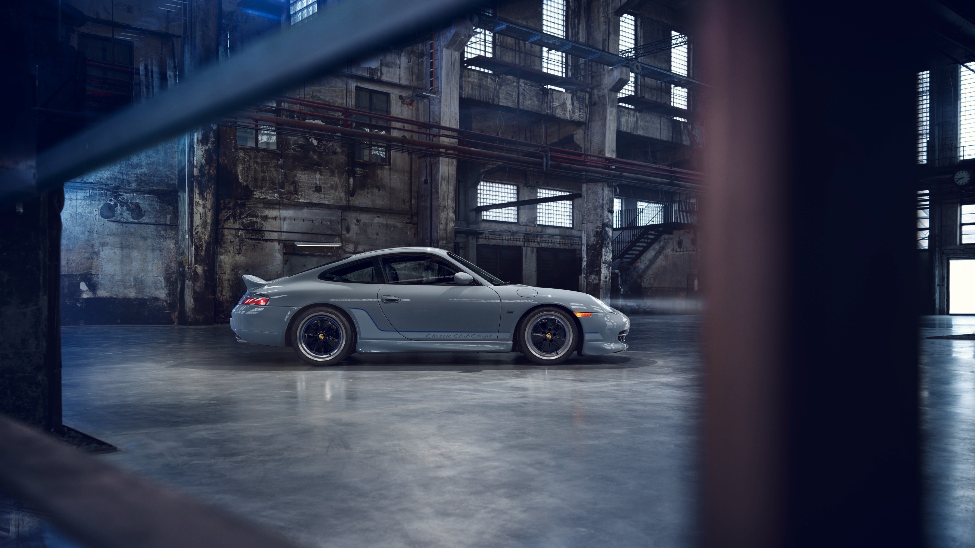 Porsche 911 Classic Club Coupe with Fuchs wheels in warehouse
