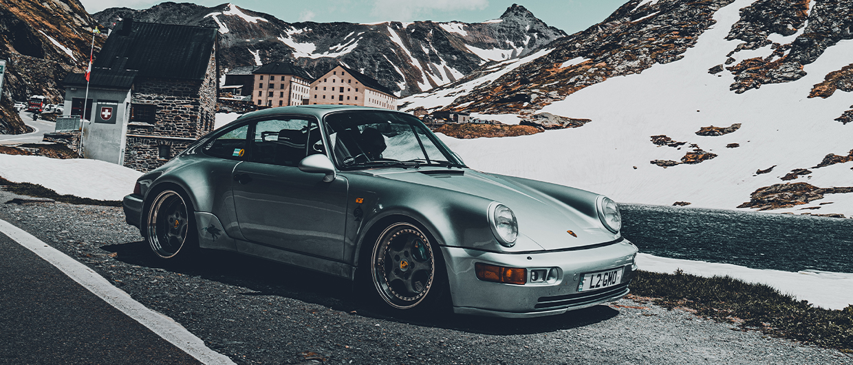 911 (964) anniversary edition in Polar silver in mountains