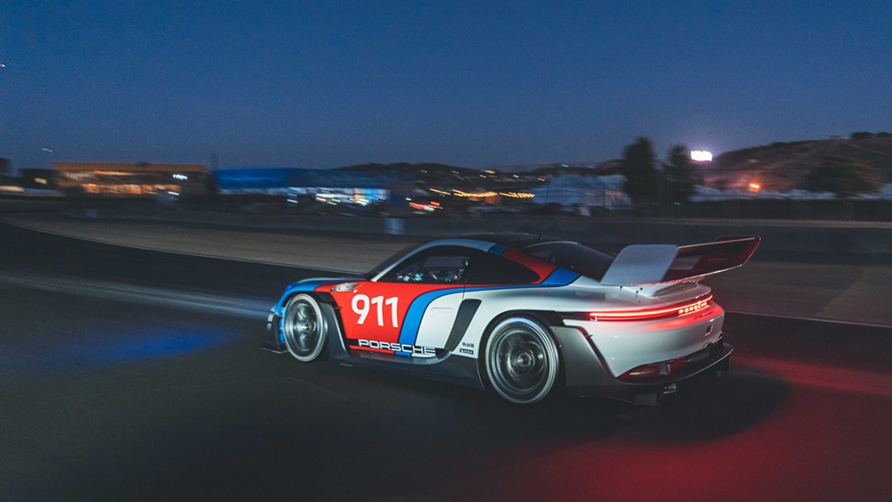 Porsche GT3 R rennsport on the track at dusk