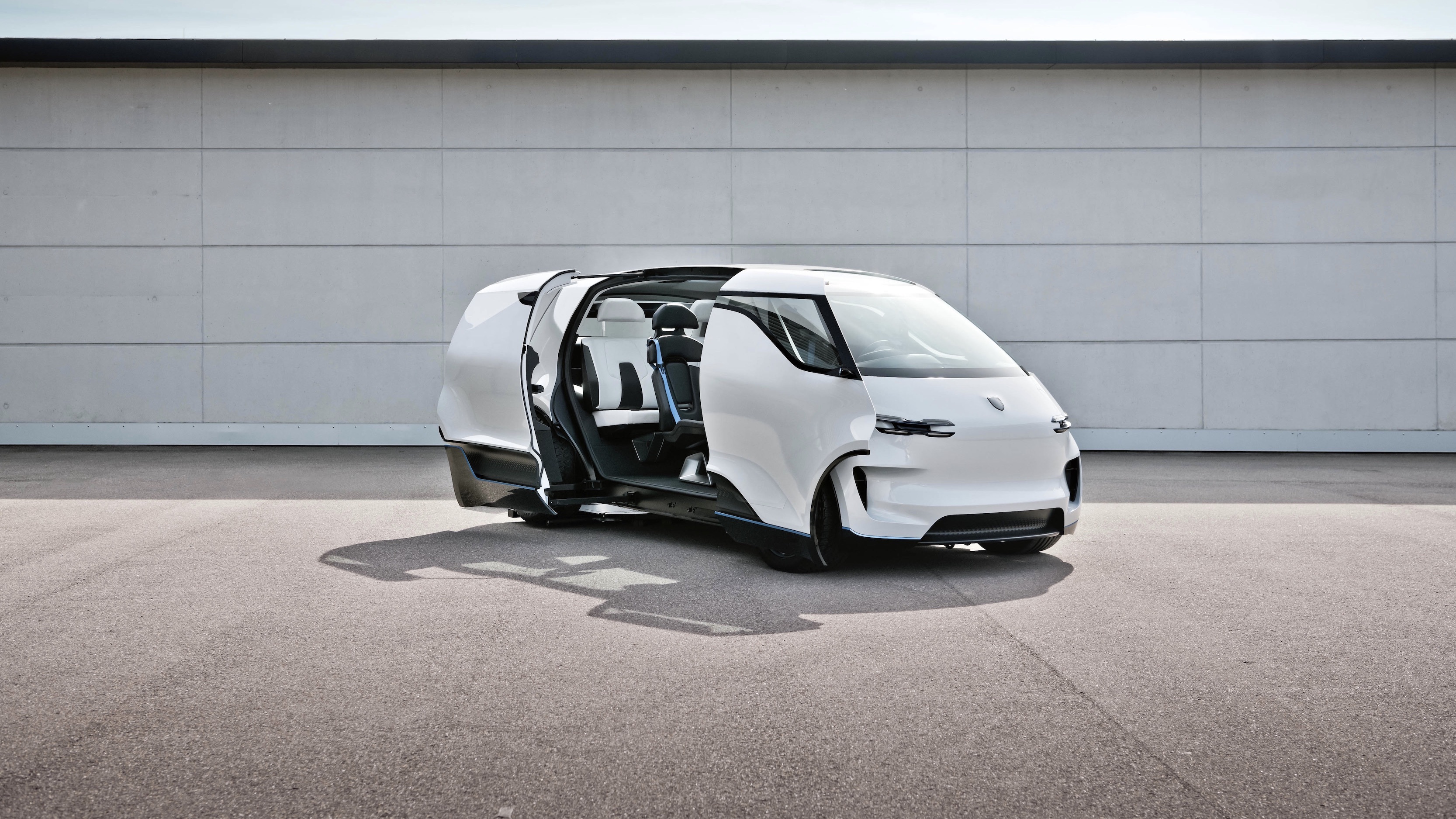 White Porsche Vision Renndienst concept car with doors open