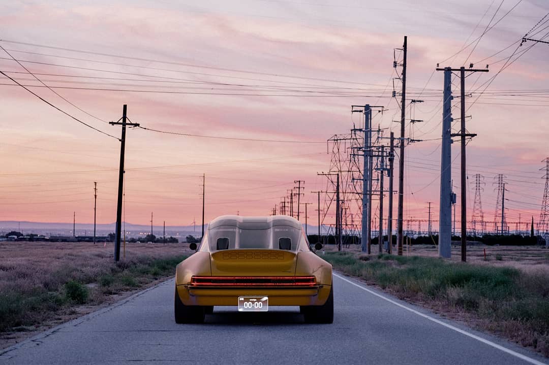 Futuristic digital yellow Porsche 930 with retracting glasshouse