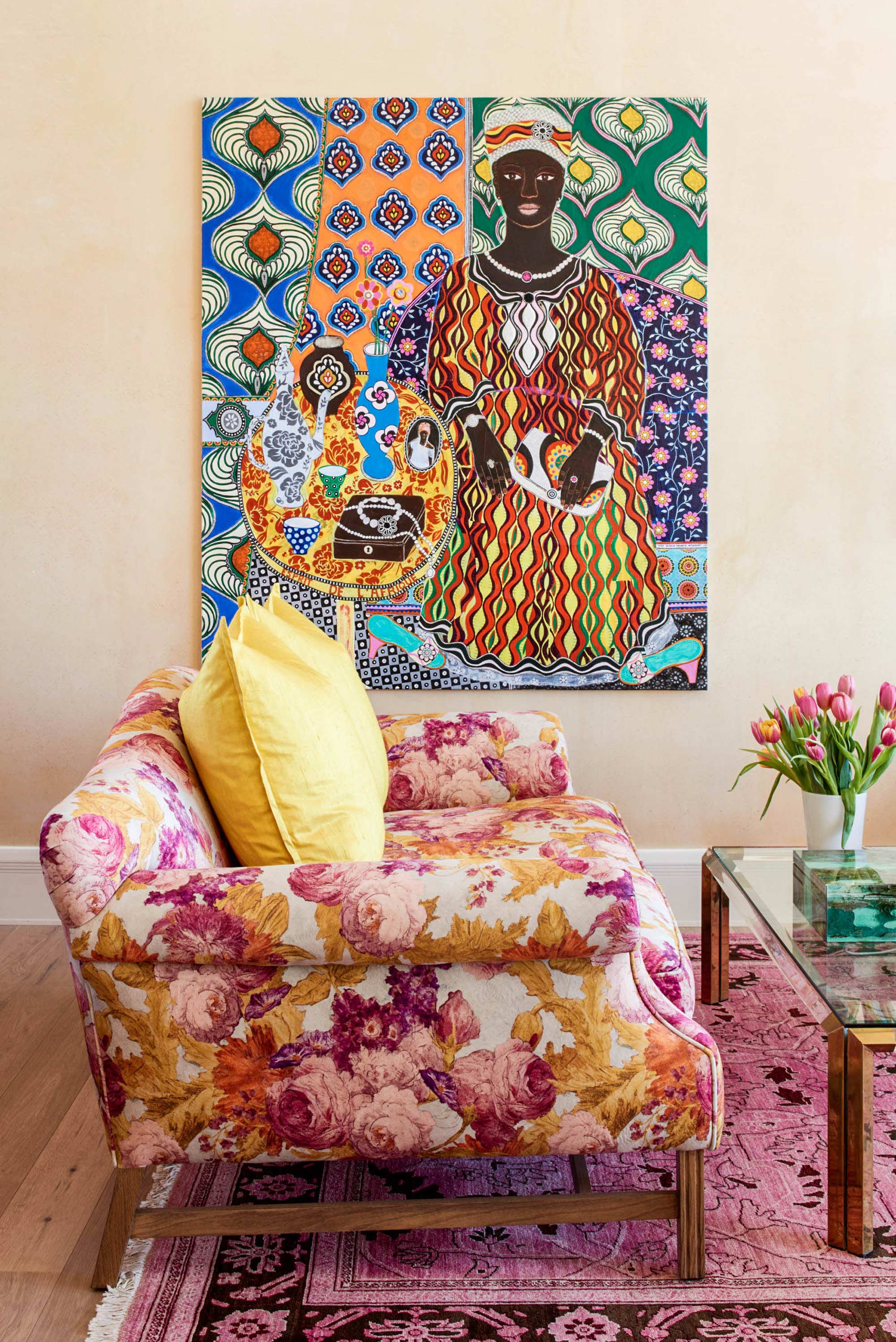 Room with African art on the walls and soft furnishings