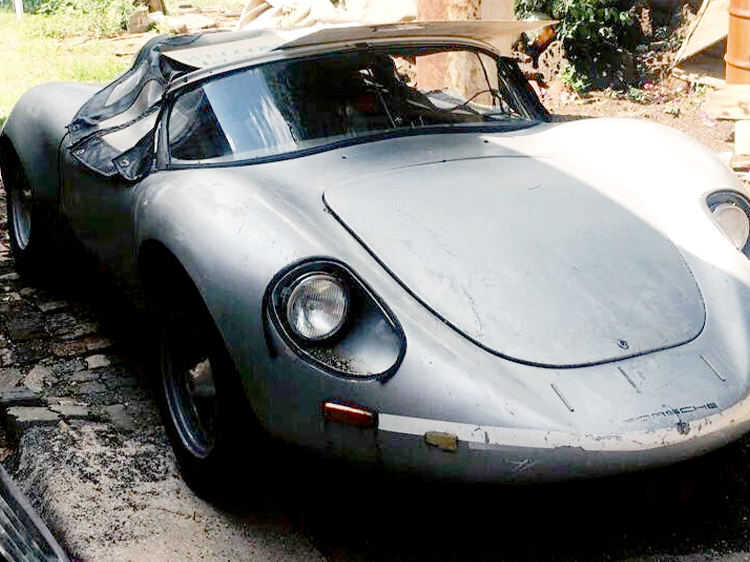 Rusted, old-timer Porsche 718 replica in silver