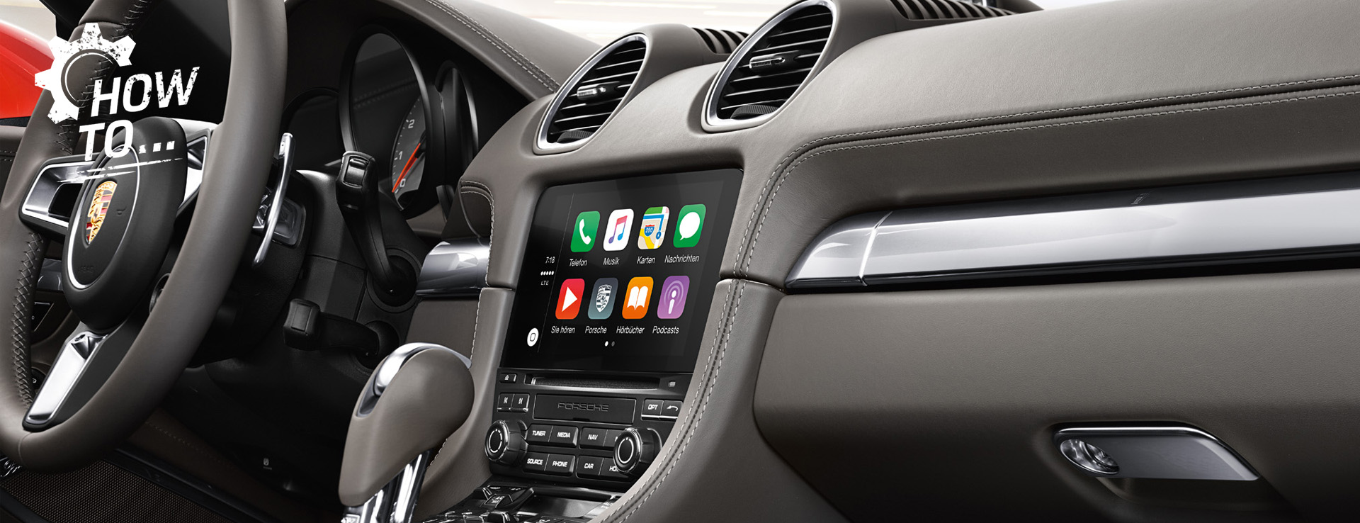 Dashboard of Porsche Cayenne with Apple CarPlay on centre display