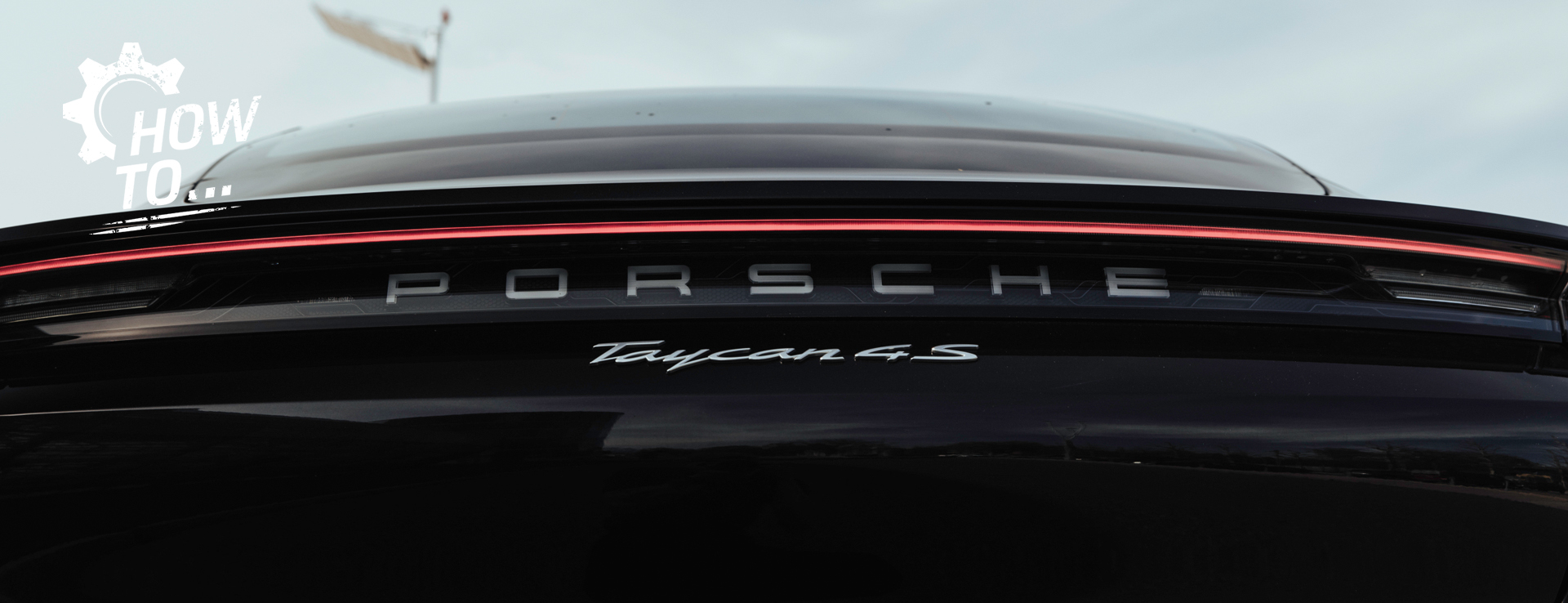 Close-up of rear of black Porsche Taycan 4S