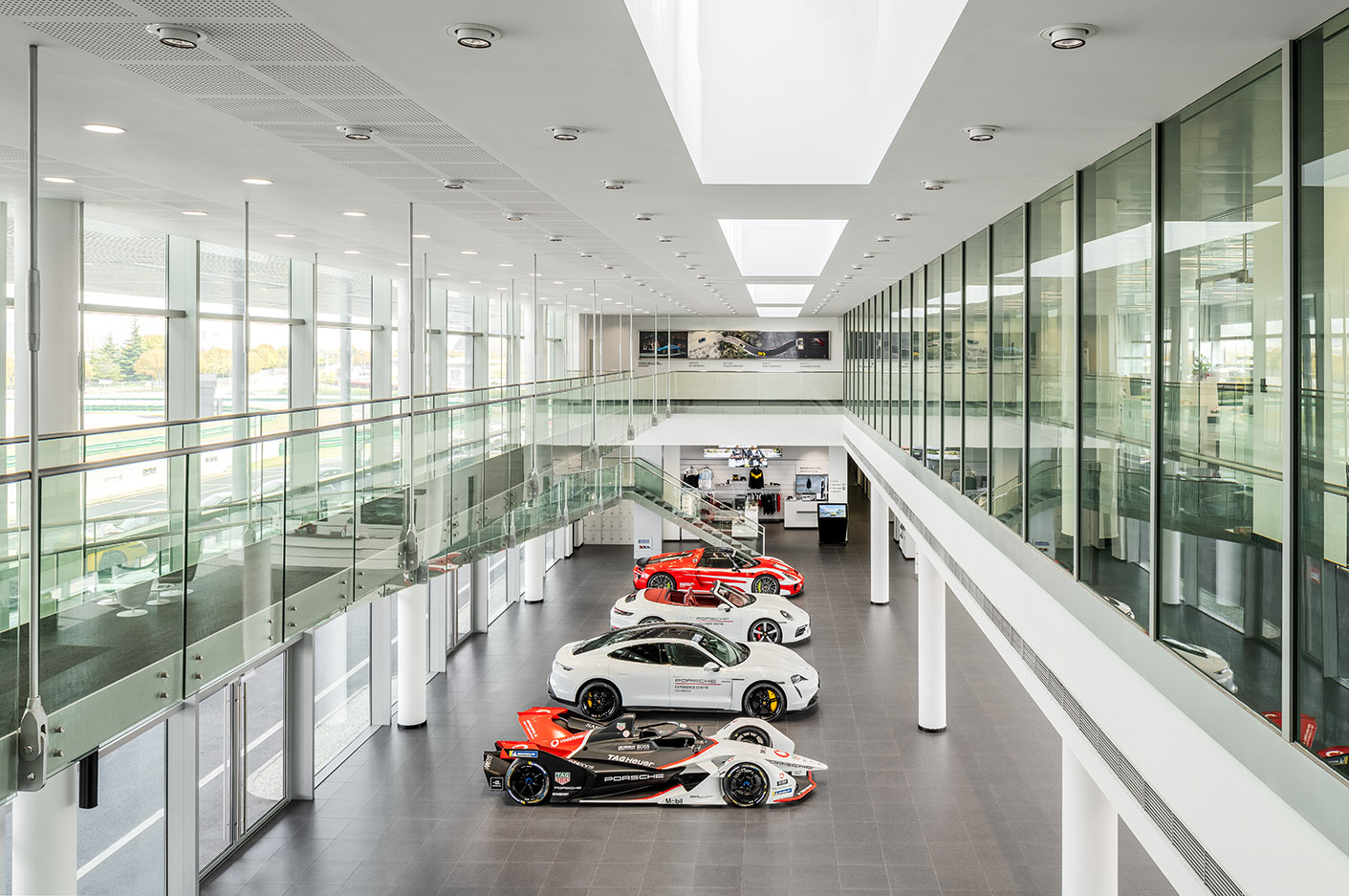 Line-up of cars inside building at Porsche Experience Centre Shanghai
