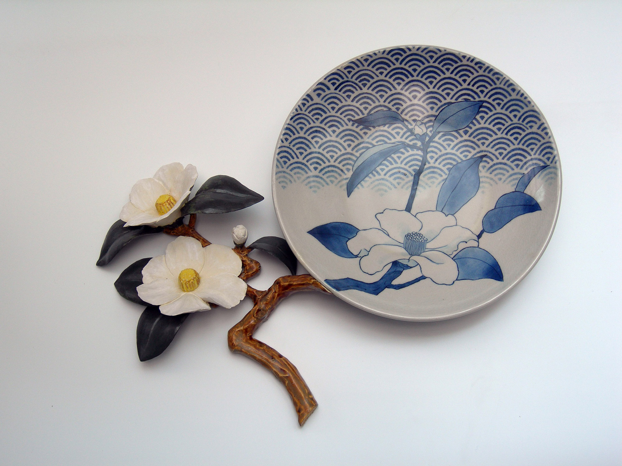 Blue and white plate featuring Japanese flower motif