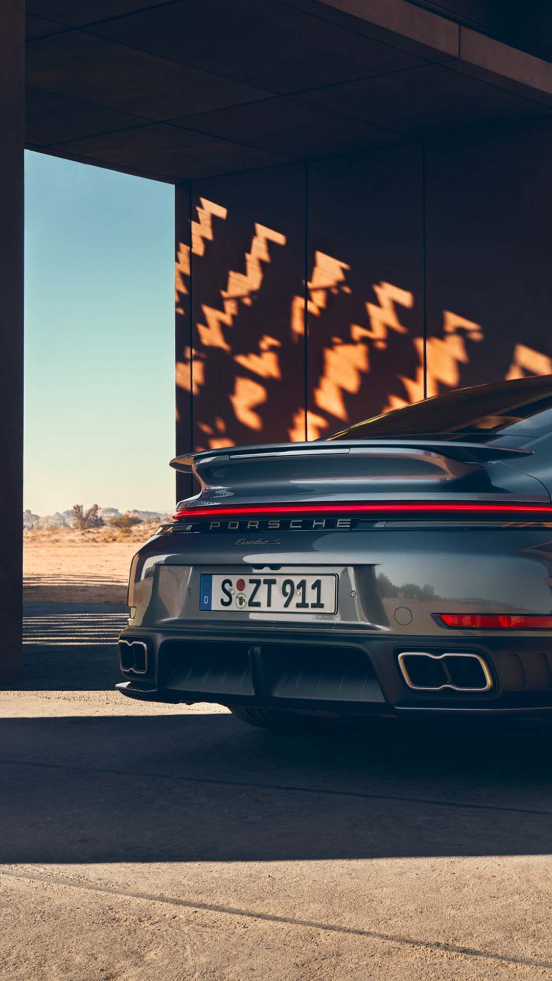 Rear side view of Porsche 911 Turbo S