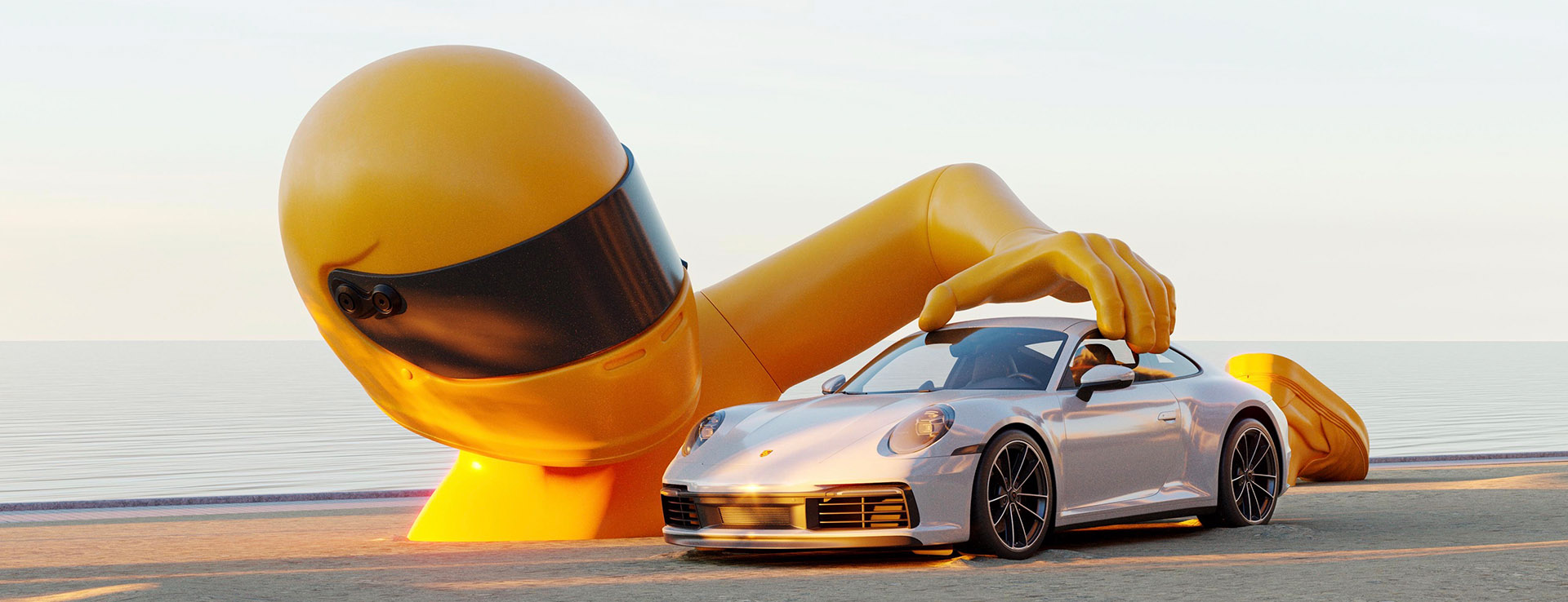 Chris Labrooy sculpture of yellow racing driver and Porsche 911