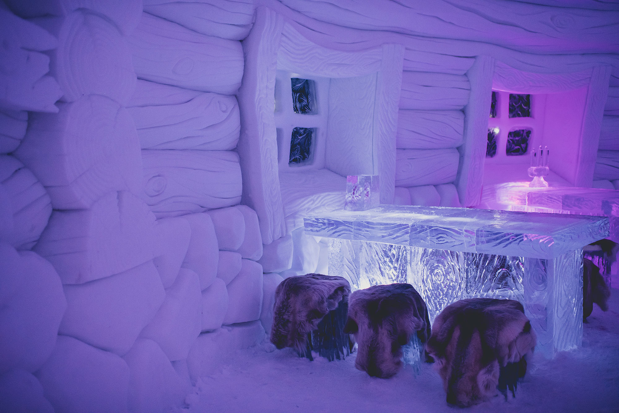 Room with walls and furniture made of ice