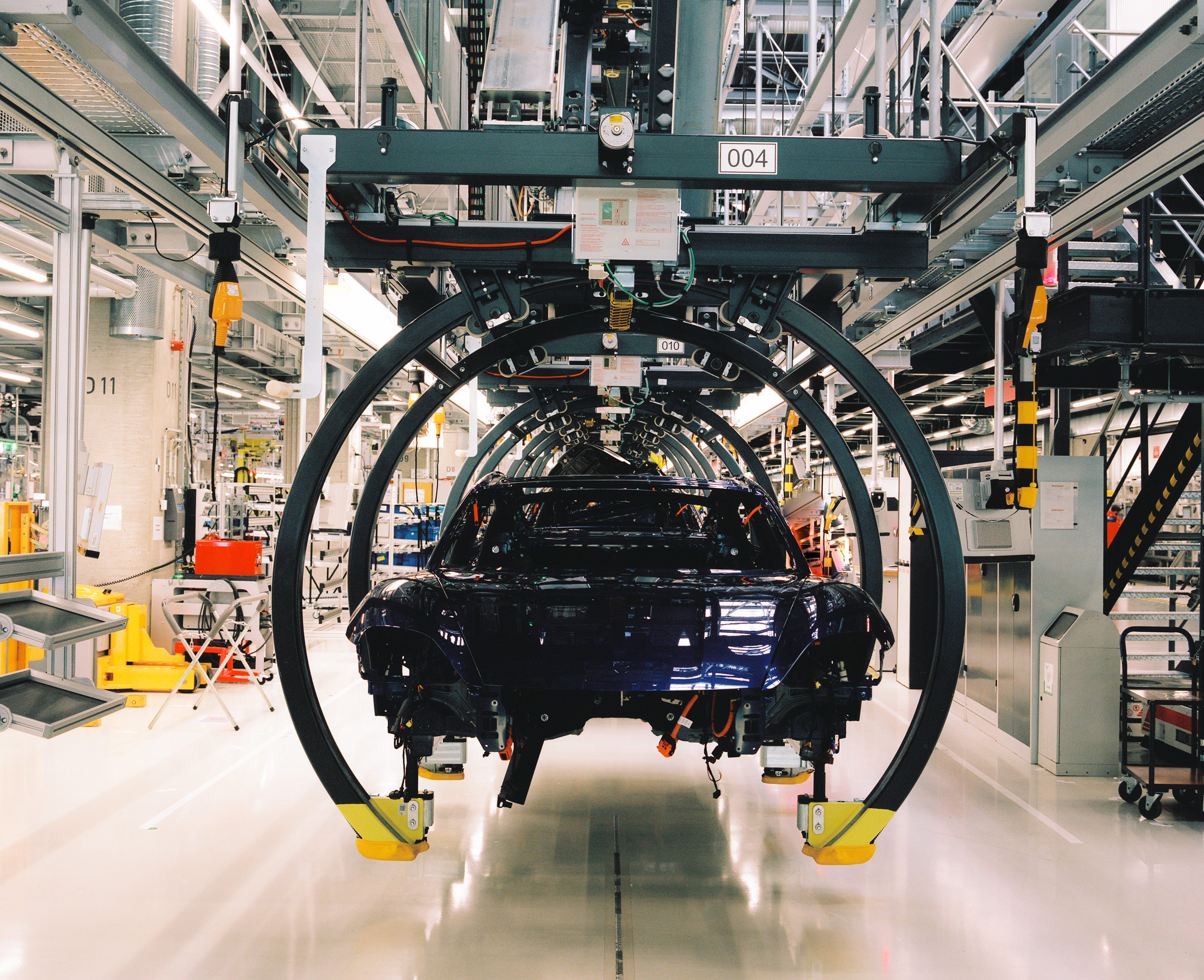 Porsche assembly line in modern automotive manufacturing plant