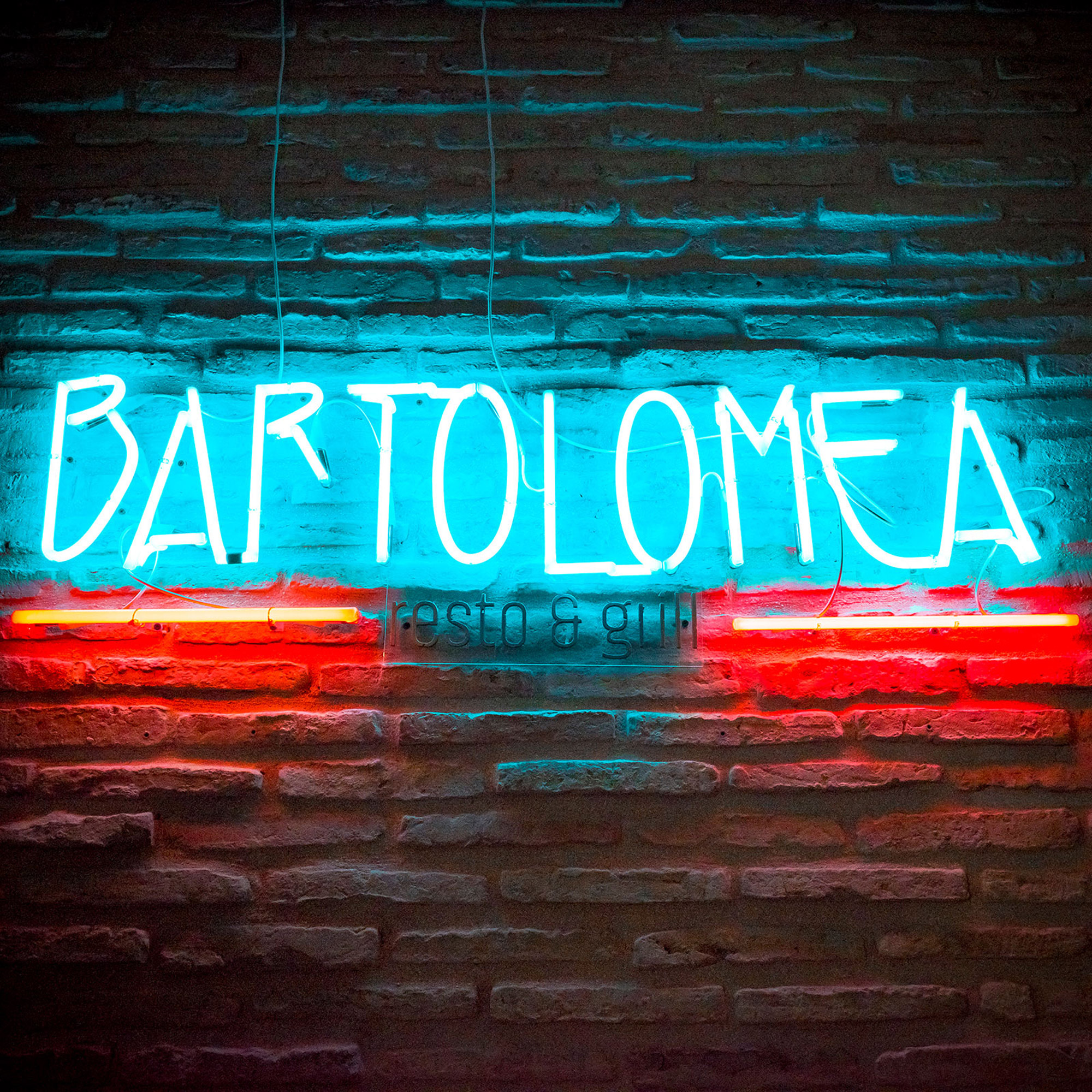 Illuminated logo for Seville’s Bartolomea restaurant