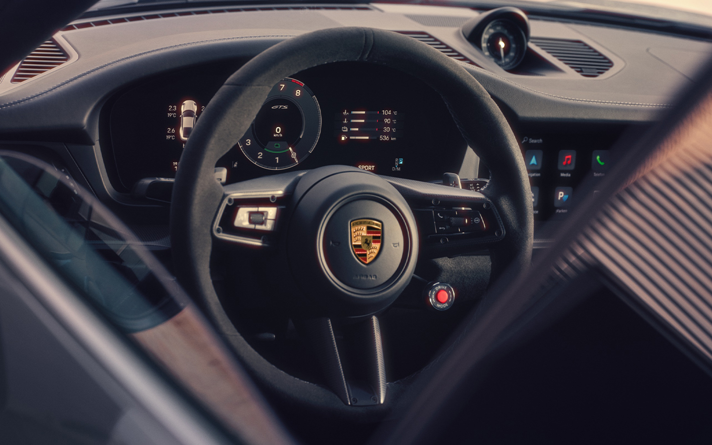 Cockpit of Porsche 911 (992.2) showing 12.65-inch curved display