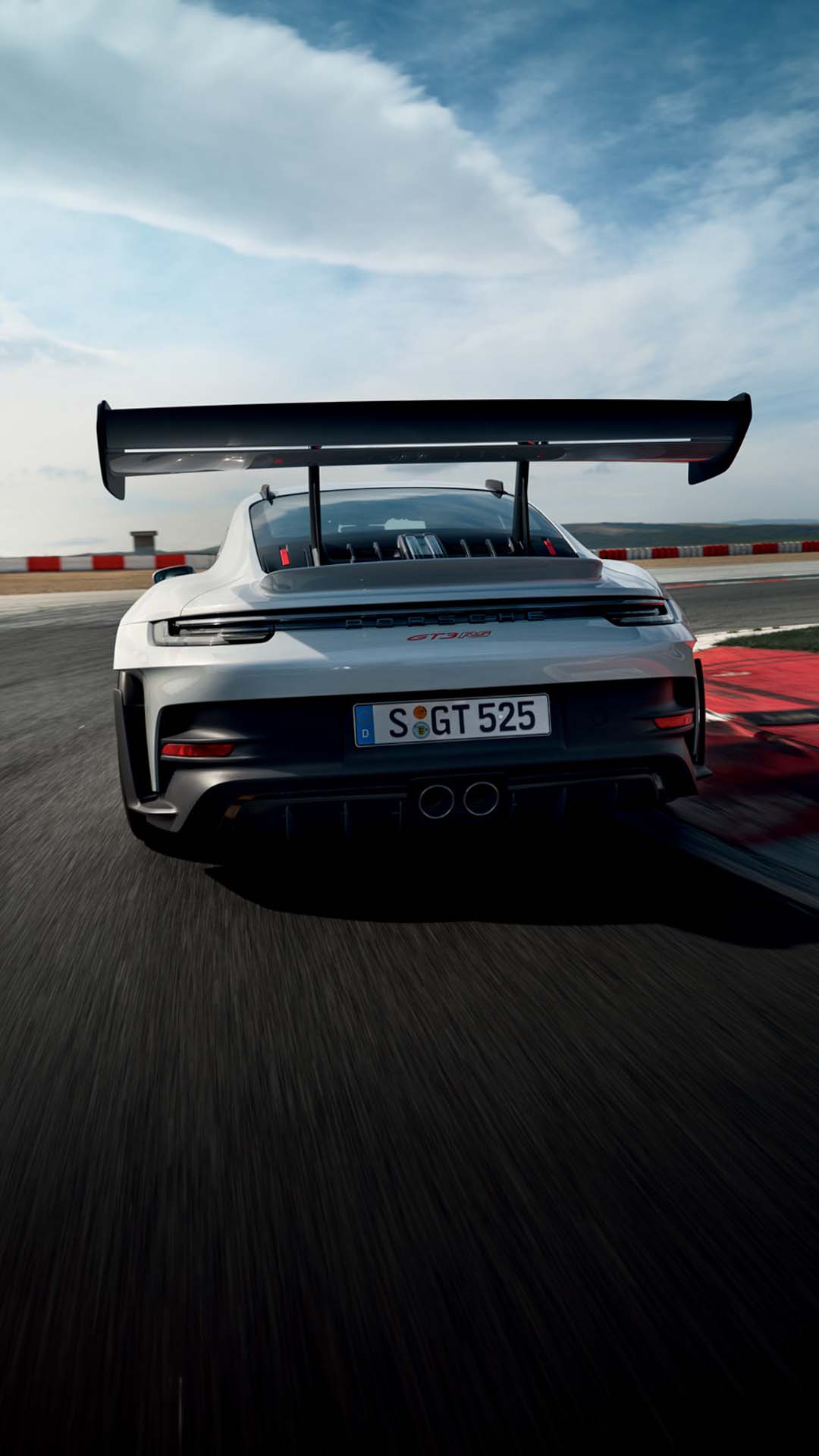 Porsche 911 GT3 RS cornering racetrack wallpaper mobile 2 