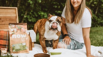 English Bulldog and owner having a picnic with bag of NOW FRESH dry food