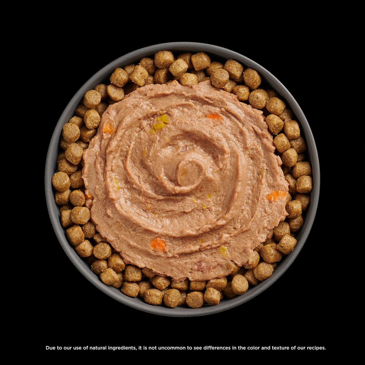 Go! Solutions Booster Tuna + Salmon Pâté food topper on bowl of kibble