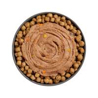 Bowl of kibble topped with Go! Booster Immune Health Tuna Pâté for cats
