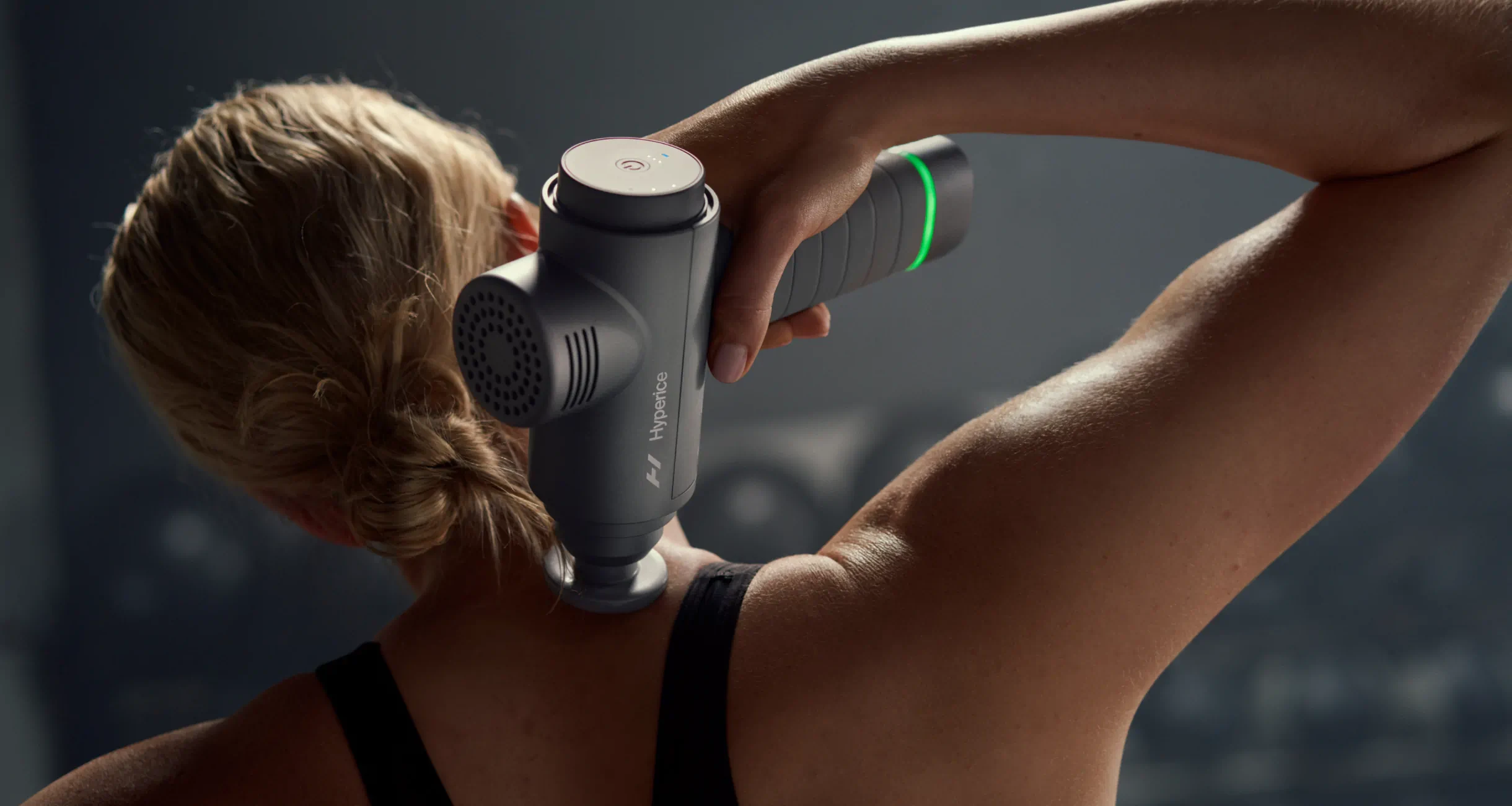 How to use massage gun on back