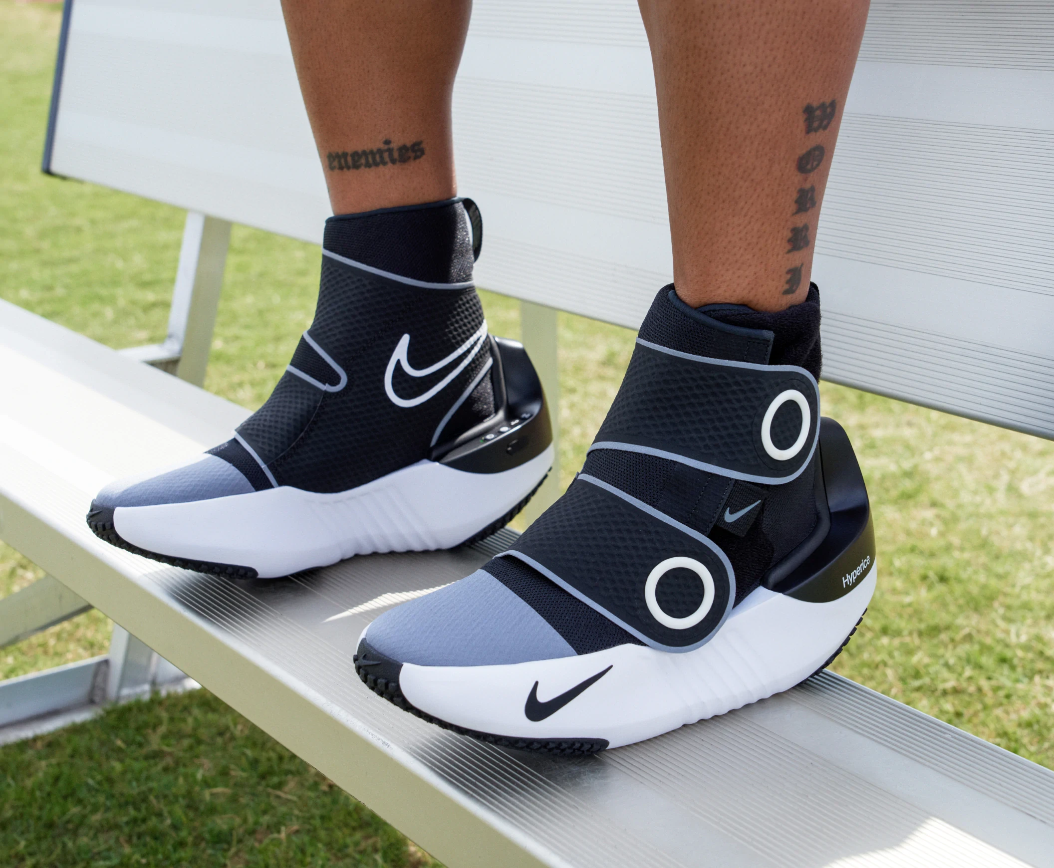hyperboot-on-feet-on-bench-
