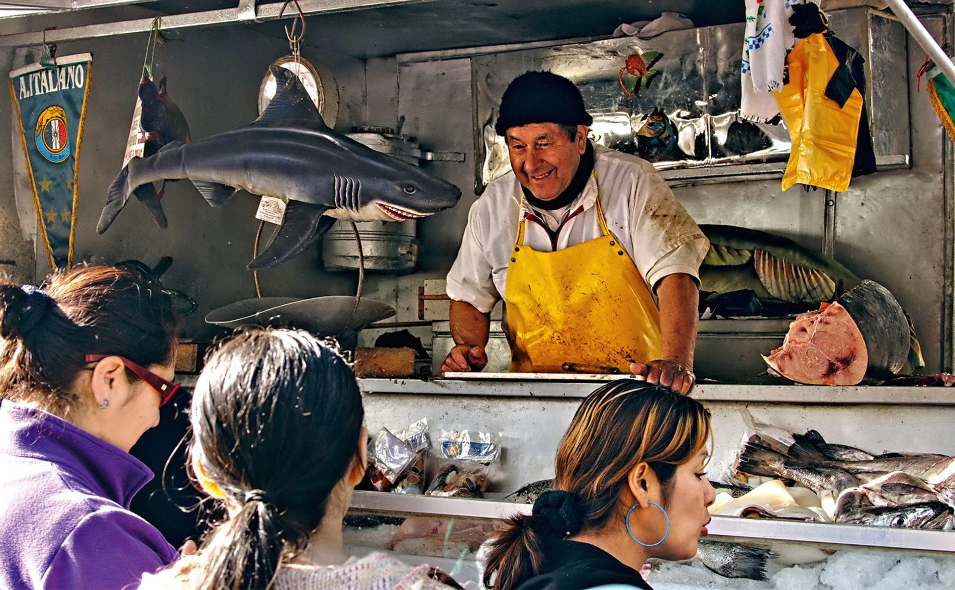 A fishmonger at the Sunday market.