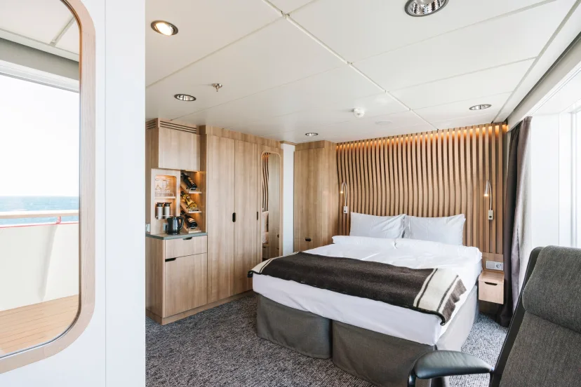 An Arctic Superior: Outside cabin | Upper deck | With Balcony (XTD) onboard MS Fridtjof Nansen. Credit: Clara Tuma