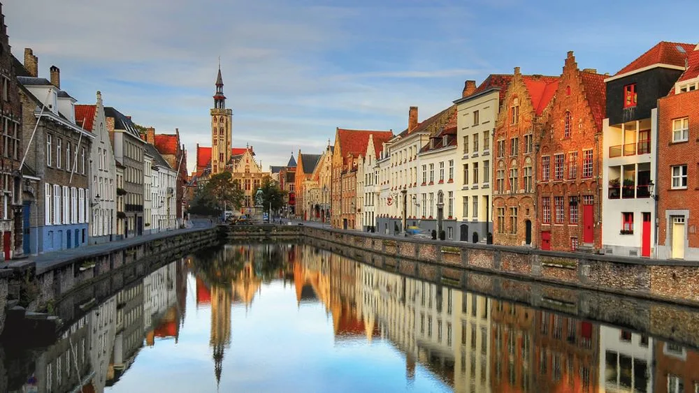 Bruges, the capital of West Flanders in northwest Belgium, is distinguished by its canals, cobbled streets and medieval buildings. Credit:  Aubrey Stoll / Getty Images / Hurtigruten Expeditions