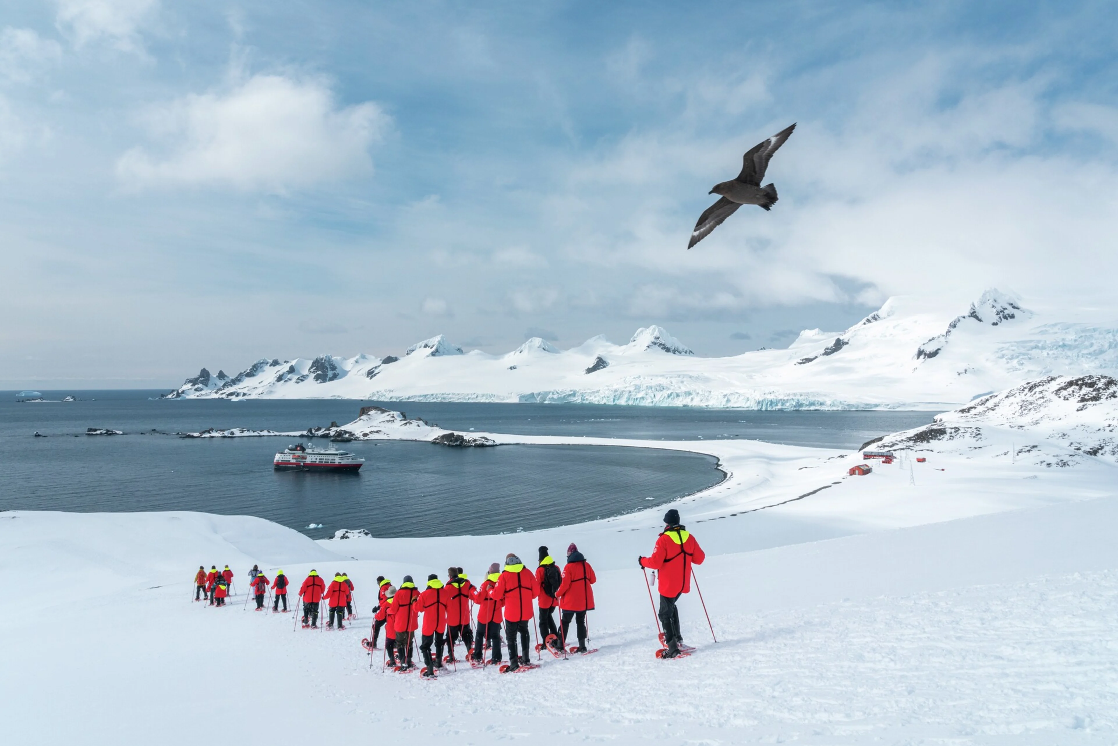 Guests snowshoeing on Half Moon Island, Antarctica. Credit: Yuri Choufour. 