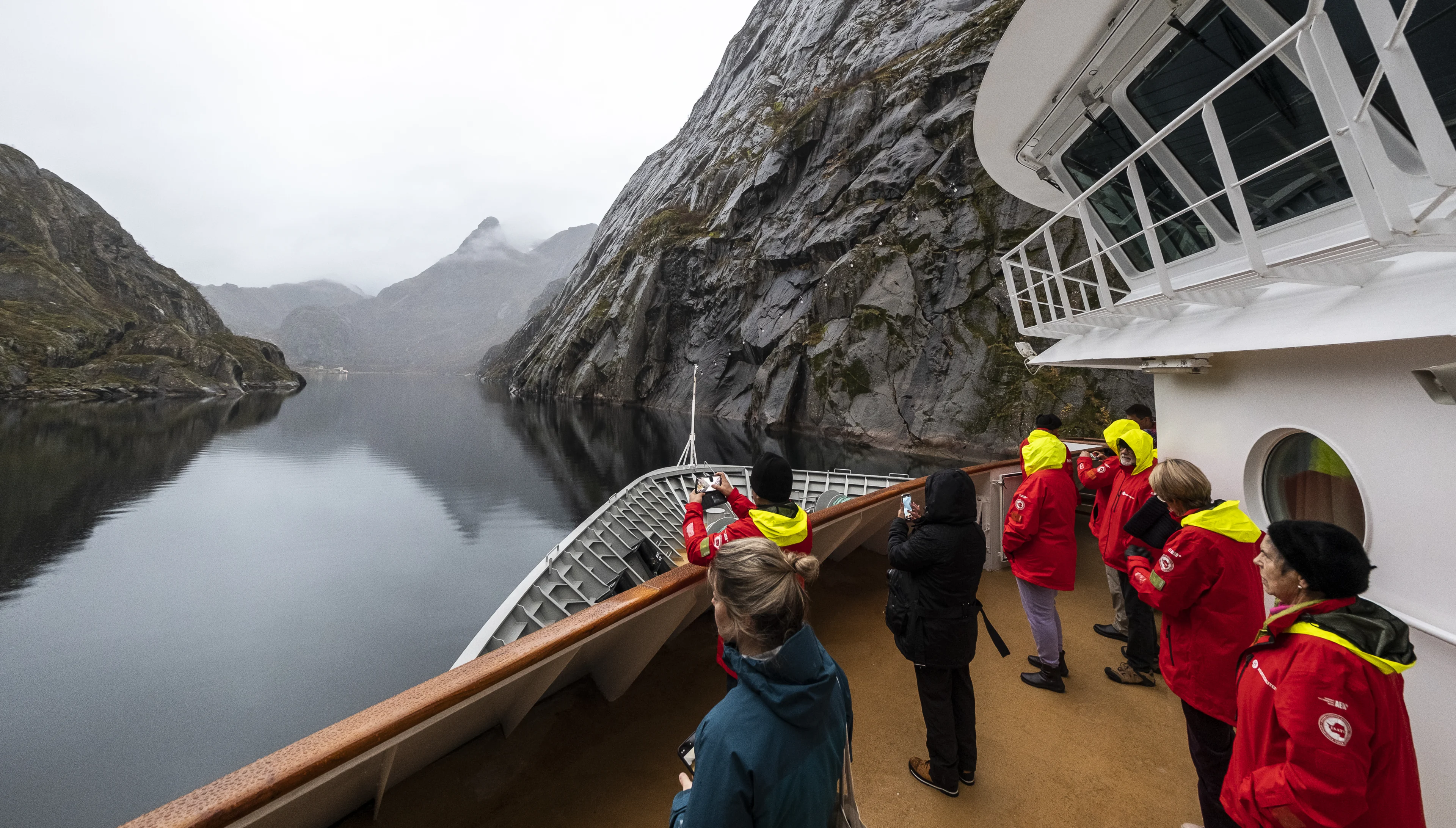Guests on board MS Maud, sailing into the Lofoten Islands, Norway. Photo: Tommy Simonsen