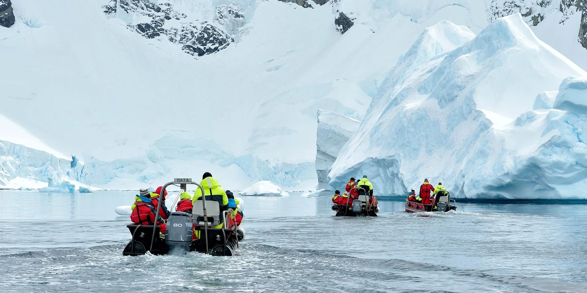 Expedition boats exploring the icy waters of Antarctica. Credit: Marsel Van oosten.