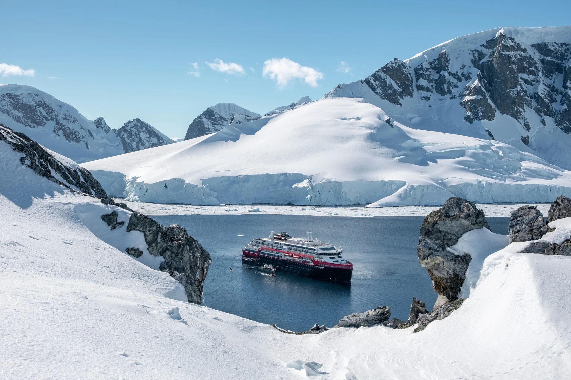 MS Roald Amundsen anchored in Orne Harbour, Antarctica. Credit: Andrea Klaussner / HX Hurtigruten Expeditions