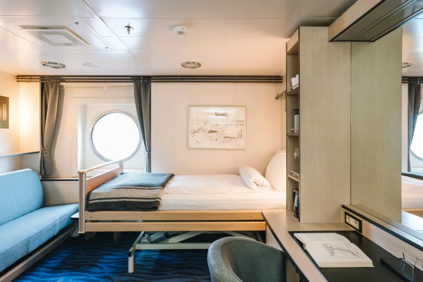 Bedroom in an Outside cabin | Accessibile (SD) onboard MS Fram. Credit: Clara Tuma