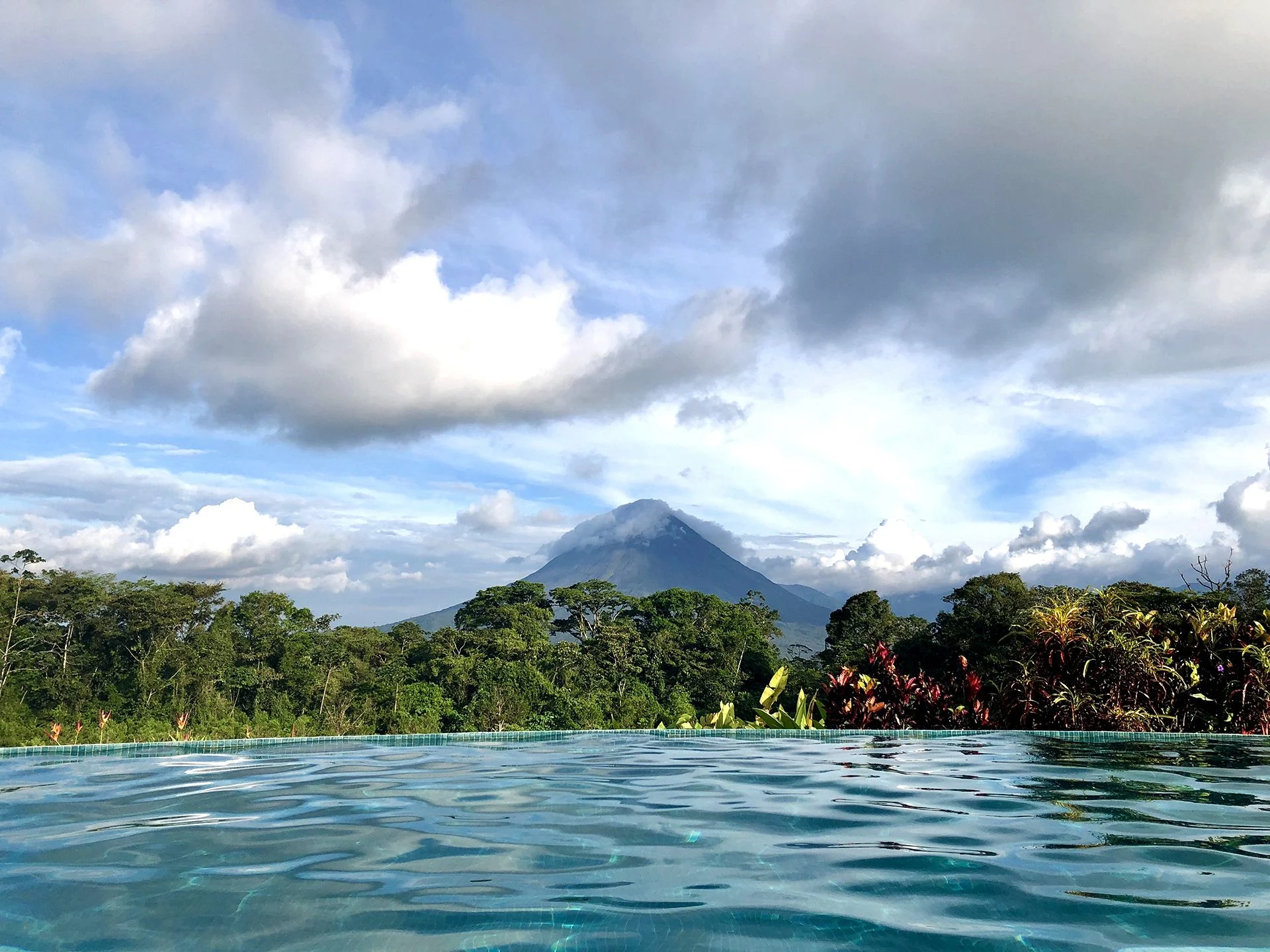 An infinity pool looking out to the Arenal Volcano, San Jose, Costa Rica. Photo: Shutterstock